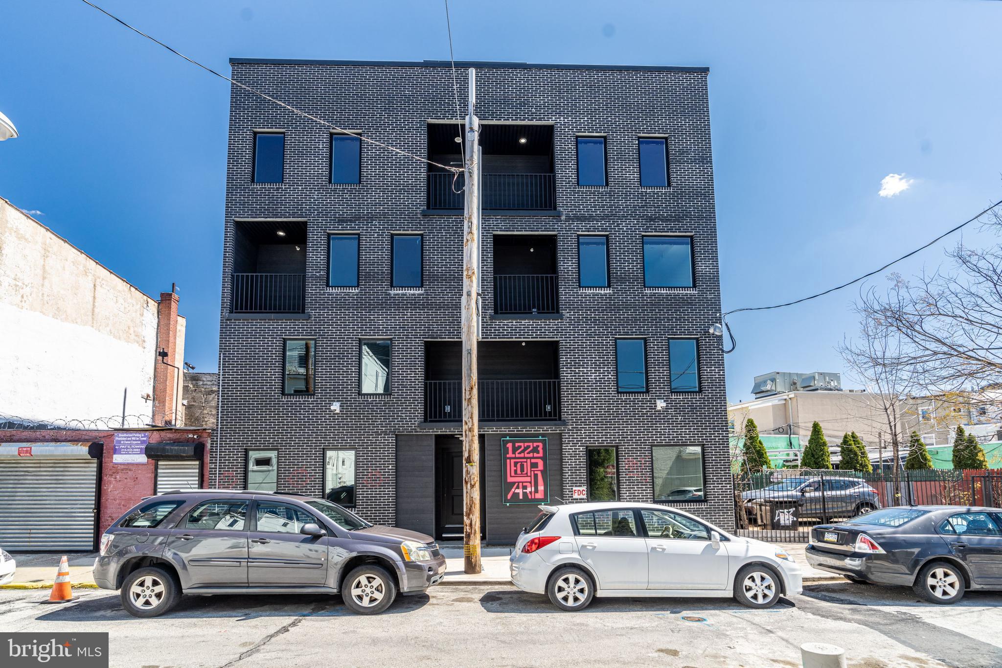 Amazing opportunity to own a SIX unit brick apartment building with massive roof deck in a prime Fishtown location! This stylish new construction building was completed in spring of 2022 and is just a half a block from bustling Frankford Ave and the El (subway), the location can’t be beat. Annual rent roll for 2024 was $177,000. Incredibly low taxes $2,239/yr! Full tax abatement until April 2032. Two (2) ground floor units are bi-level and include 2 bedrooms, 2 full bathrooms, and large private yards. Two (2) second floor units include 1 bedroom, 1 bathroom, and shared balconies. Two (2) third floor units are bi-level and include 2 bedrooms with shared balconies, 2 en-suite bathrooms, 1 half bathroom and private balconies on the main living level. In addition to the private yards and balconies offered with each unit, all units share a large 1500+ sqft common roof deck with panoramic views of the city skyline. Black sound transmission class Pella windows with built-in blinds between the glass, spray foam insulation throughout, PEX plumbing manifold, fiberglass roof, security surveillance system, custom steel security gate and bike room gate, recessed LED lighting, matte black hardware and fixtures… Large kitchens include gas cooking, stainless appliances, quartz counters, and tiled backsplash. Water and scratch resistant luxury vinyl wood flooring throughout, the perfect long lasting flooring choice for durability with tenants and pets. Tile flooring in lower level. All units include washer/dryers, double sink vanities, great closet space, and stylish finishes throughout. Each unit having outdoor space is a rare find in apartment buildings and added bonus! Large irregular lot, approximately 40' wide and 56' deep, allows for spacious units and outdoor living spaces. Steps away from public transportation, restaurants, coffee shops, gyms, galleries, parks, vibrant nightlife, and everything else that Fishtown offers! Fully occupied, must give tenants 24hrs+ for any showings. Builder and listing agent present for all showings.