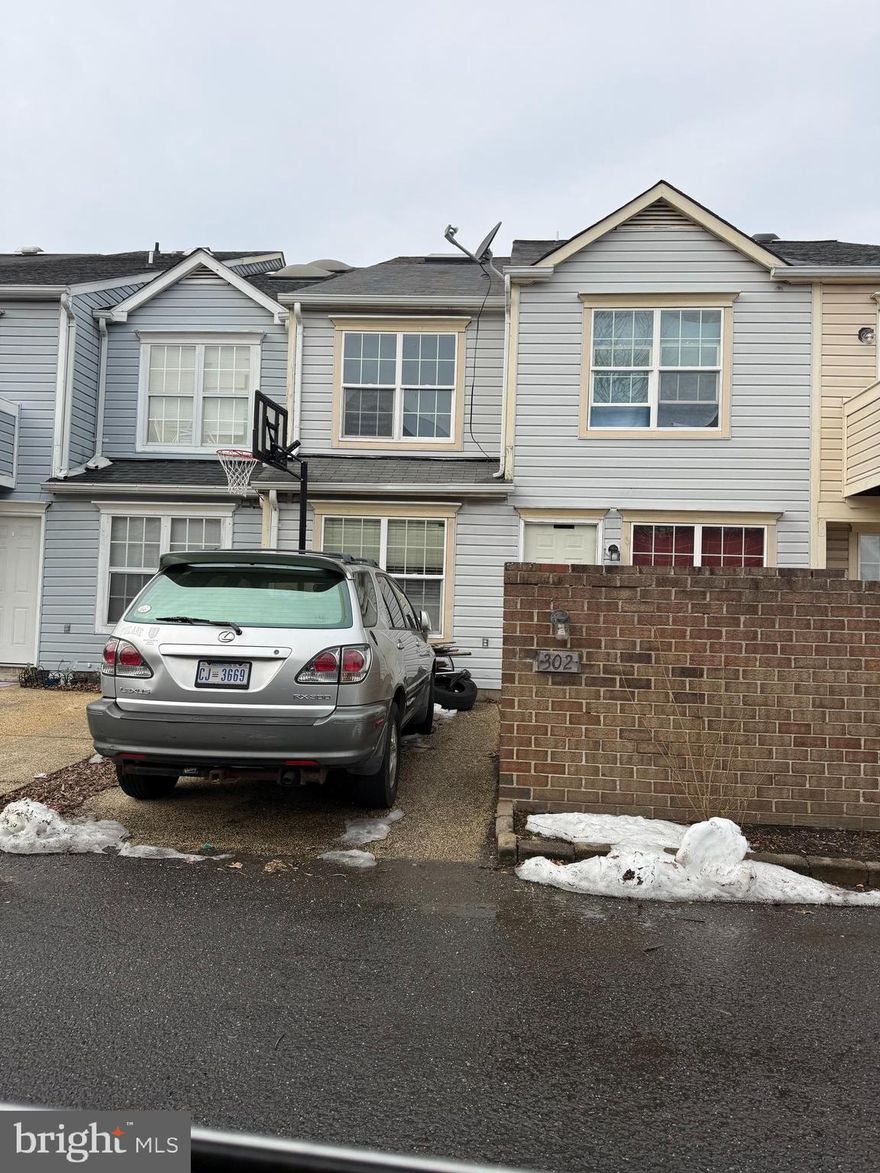 "Welcome to this cozy, three-bedroom, one-and-a-half-bath townhouse. This charming, two-story interior unit features a cozy kitchen, a bright living room, and an eat-in dining room. Enjoy off-street parking in the front and a nice little yard in the back, plus a lovely front area. This home is being sold 'as is, where is.'