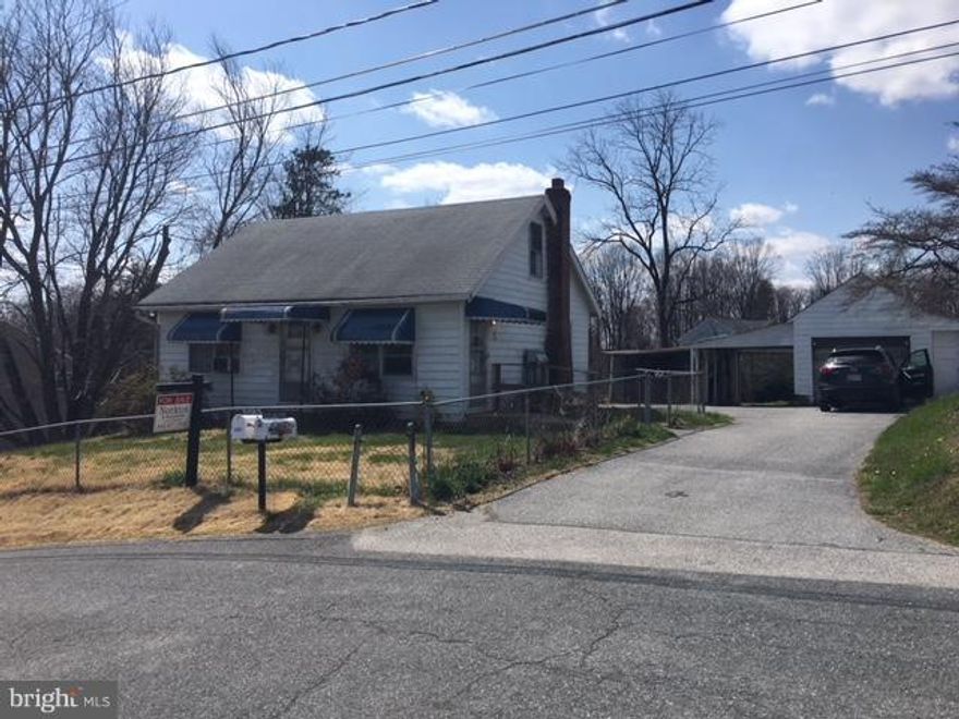 LARGE LOT in Howard County -  Two parcels totaling 0.64 acres. Existing home, work shop, and large garage currently on the property. Great opportunity to renovate and build your dream home on a large lot!