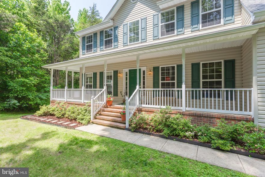 HUGE PRICE REDUCTION.  BEAUTIFUL & SPACIOUS HOME. 4.66 acres with mature trees & landscaping. Large kitchen with new granite & SS appliances. Five upper bedrooms, fabulous master bedroom with enormous walk-in closet. Finished LL which includes a work room & full bath. Close to VRE, I-95 & Quantico.