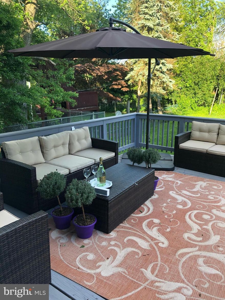 Enjoy everything you need from entertainment to comfort in this home. Home offers designer kitchen with quartz counters & SS appliances. Entertain or BBQ on large deck just off the kitchen. In the finished basement plus den, host movie, game, or family nights. This move-in ready home offers 9Ft Ceilings, HW flooring, 3 bedrooms plus den, 2.5 baths, walk-in master closet, and upstairs laundry.