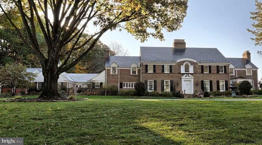 Situated on over 2.5 acres of private land sits this OUTSTANDING estate. One of a kind home & setting.  Immediately fall in love w/custom details throughout & over 8000 sq ft!  4+ gar w/2nd flr poss game rm, pool w/pool house that incls, FB & kit!  Stunning floors, exquisite baths & chefs kitchen.  This has it all! Gated driveway & more!