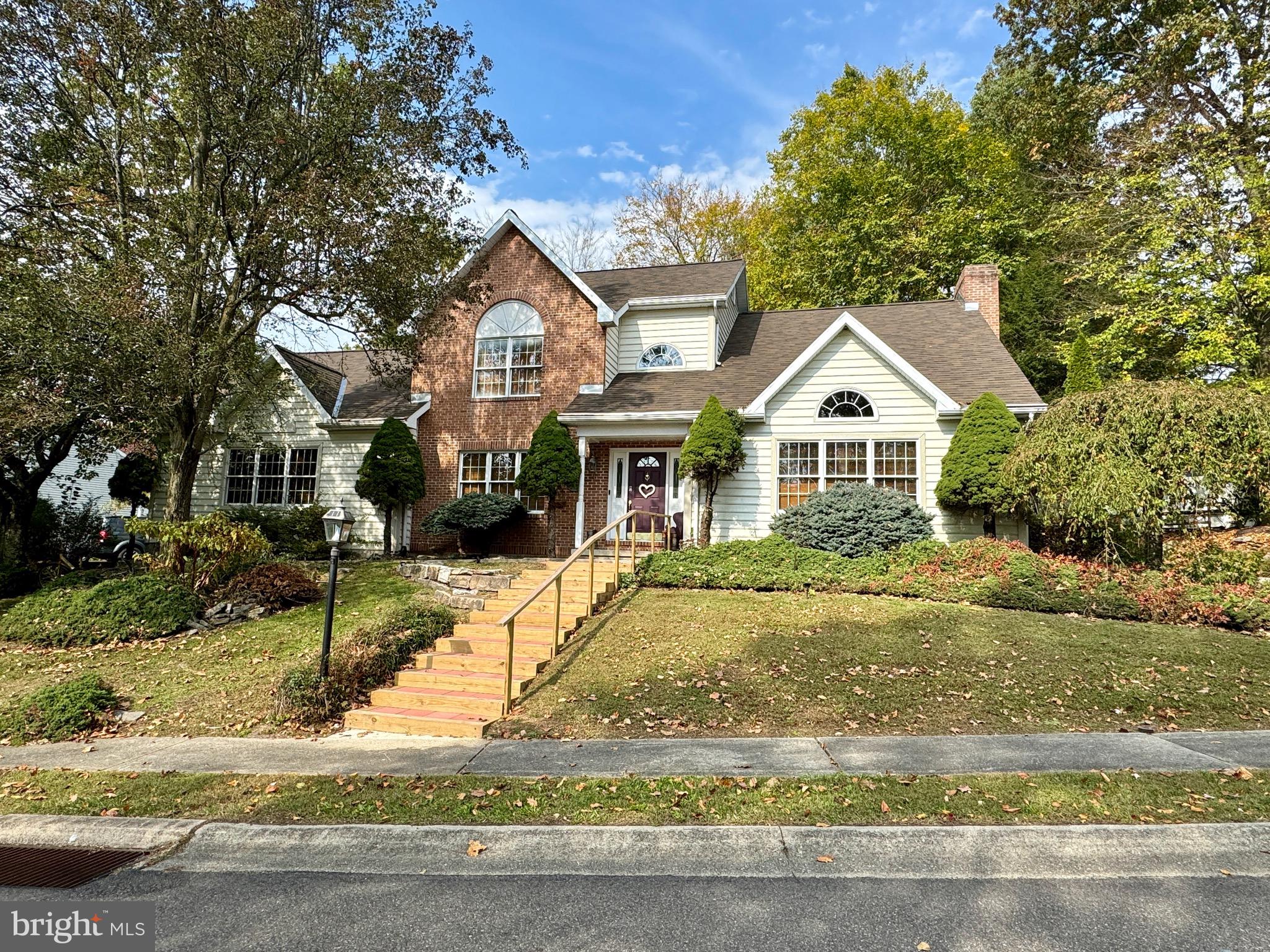 This stately contemporary is located in the desirable Norwegian Woods Development. Brand new front steps lead you to the front door. Step inside to the 2 story foyer as hardwood flooring greets you as you enter the home, and can be found throughout most of the home. The formal living room features a vaulted ceiling and leads into the family living room which houses a brick, wood burning fireplace. Step through the glass French doors to the bright and cheery sunroom, which can be used as a personal office. The formal dining room is elegant featuring decorative chair rails and crown molding.
Granite countertops and matching granite center island with seating, and tile backsplash can be found in the kitchen. Enjoy the backyard while sitting in kitchen nook, finished with chair rails. Laundry room, mud room, and half bath can be found off the kitchen and just outside the 2 car garage.
Upstairs you’ll find the primary suite featuring a walk-in closet, primary bath, which features a garden tub with jacuzzi, double sink and shower.
Three additional bedrooms, and a hallway bath completes the upstairs.
Entertain your family and friends in the finished lower level basement which includes a wet bar and full bath. An exercise/recreation area and ample storage complete the basement.
This home has a great outdoor living space on 0.6 acres.
Schedule your tour today!