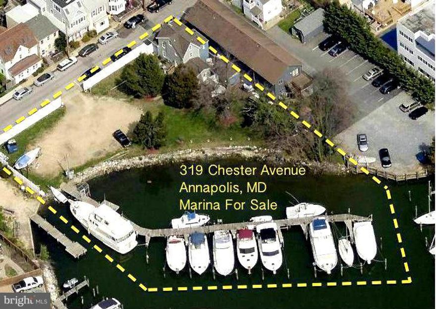 Home with Upper and lower rental units, fully remodeled.  To include Marina with 16 slips and 200 ft. of Rip-rapped waterfront, in a prime location on Back Creek, 6ft. deep water.  Sold with Marina permitted for full replacement work to be done, to include new pilings, decking, electric and water for all slips.  New electrical service for all slips and ready for hood-up.
