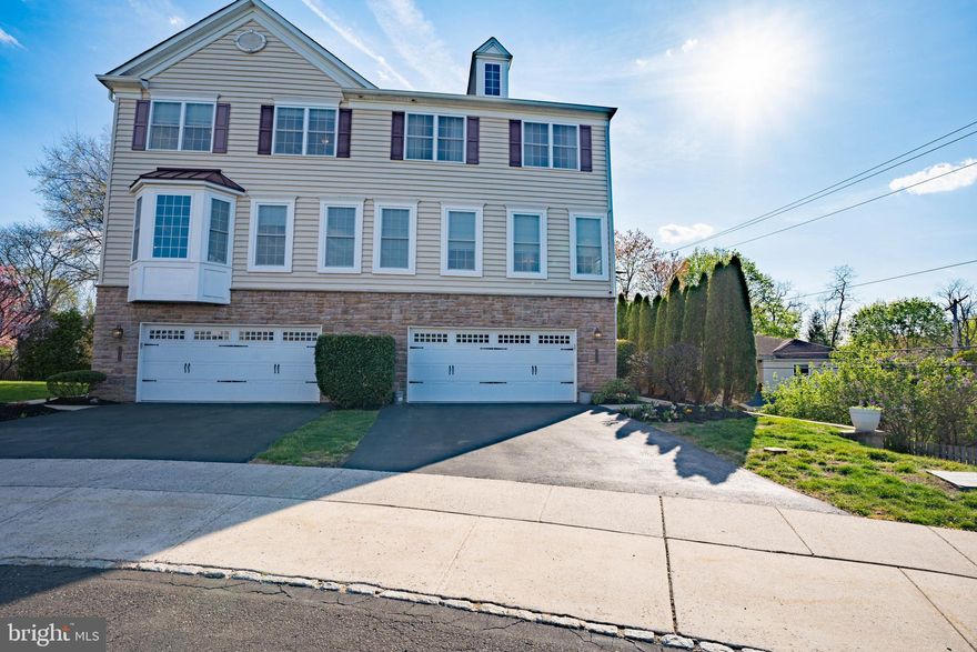 Prepare to be wowed by this stunning twin/townhome, built in 2013, nestled in the highly desirable Evergreen Terrace neighborhood of East Norriton Twp. The home boasts a sleek vinyl and stone exterior, complemented by a two-car carriage-style garage and ample parking space. A beautifully landscaped side entry, lined with shrubbery and flowers, welcomes you in. As you enter the foyer, you'll be greeted by elegant cherry hardwood floors that flow seamlessly into a spacious family room. The oversized garage offers plenty of storage space, and there’s a convenient access point from the lower level.
The living/great room is bright and inviting with an abundance of windows, a cozy double-sided gas fireplace, and a formal dining room. The gourmet kitchen is a true centerpiece, featuring 42-inch espresso cabinetry, stunning granite countertops, and stainless-steel appliances. The kitchen flows into the breakfast room, where you’ll find access to the outside deck. This outdoor space overlooks a serene, treelined backyard. The main level, you’ll also find an updated half bath. 
The upper level features a luxurious owner’s suite with vaulted ceilings, and a generous walk-in closet. The en-suite bathroom is a retreat in itself, with a double sink vanity and an oversized shower with a seating area. Two additional spacious bedrooms with ample closet space, and a full hall bath that complete this level. For added convenience, the upper level also houses a dedicated laundry room.
Fresh paint throughout ensures a clean, modern aesthetic that complements the neutral and tastefully decorated interior. Plus, the home features a brand-new HVAC system for ultimate comfort and efficiency.
Located just minutes from King of Prussia, major shopping centers, schools, and highways, this home offers both privacy and convenience.
This move-in-ready gem is an A+ home in a fantastic location—don’t miss your chance to make it yours!