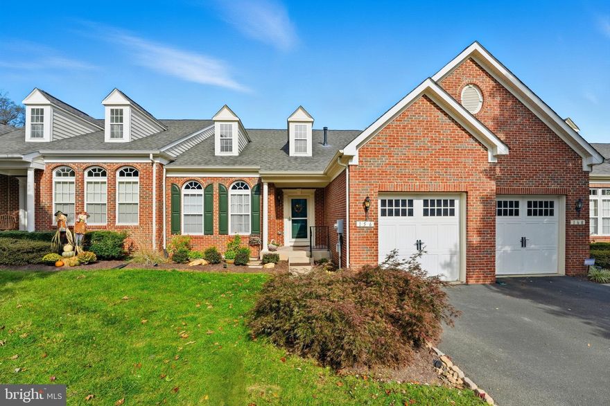 If you want to be close to town, have true main-level living, and move into a home where the work is already done — this is it.

This villa-style townhome offers an open layout with cathedral ceilings and natural light that immediately makes the space feel expansive. Hardwood floors run throughout the main level and lead into a thoughtfully designed kitchen with granite countertops, tiled backsplash, black stainless steel appliances, and a vaulted bump-out that creates the perfect sun-filled dining or sitting area.

The kitchen layout simply works — two bar seating areas, a center island for prep, gas cooking, pantry storage, and pull-out cabinetry that keeps everything accessible and organized.

The main-level primary suite features upgraded carpet and pad, a walk-in closet, and a spacious ensuite bath with soaking tub, dual vanity, and additional storage — comfortable, functional, and easy for everyday living.

In the living room, a newly added electric fireplace with a custom mantle creates a strong focal point, while vaulted dormers draw in even more natural light. Just outside, a spacious deck overlooks a stamped concrete patio below — giving you two levels of outdoor space to relax or entertain.

And the major improvements? Already handled.
New Trane HVAC.
New hot water heater.
New sump pump.
New smoke detectors.
Security film on all windows and doors.
Upgraded lighting.
Stamped concrete patio.

Upstairs, two generous bedrooms, a full bath, and a large storage closet (currently used as a gym space).

Walk to Main Street and enjoy the farmers market. Park and pickleball courts across the street at Academy Hill Park, or walk to Old Town Athletic Club.

It’s low-maintenance, well-updated, and positioned exactly where you want to be. Don't miss a chance to tour- Open House Sunday 3/8 from 1-3pm.