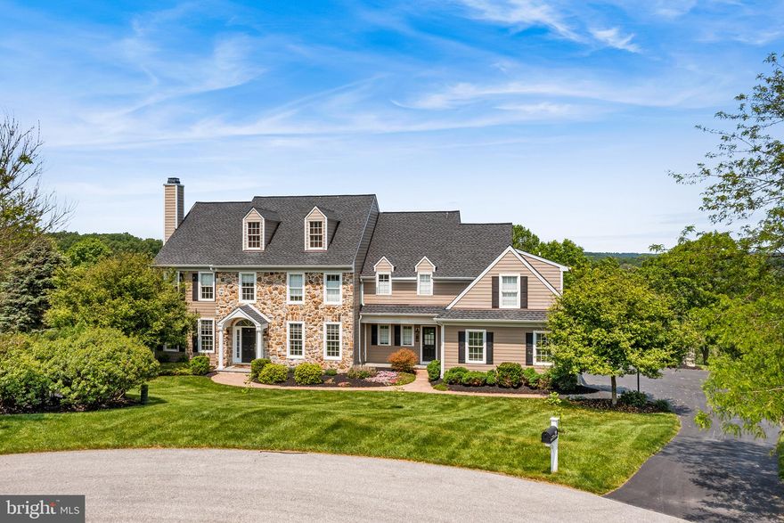 Welcome to this meticulously loved and cared for spectacular home with over 6000 sq ft of living space, including 5 BD and 5 ½ BA. Located in the highly sought after Unionville Chaddsford school district in the Olmsted community. 

Entering through the front door into the two story grand foyer, you immediately feel the elegance that surrounds you. Gleaming hardwood floors greet you and stretch throughout the entire main floor. A traditional style main floor offers a formal living and dining room that flanks the foyer, with custom design wainscotting and crown molding. The entire floor connects creating the perfect atmosphere to entertain, or find yourself a quiet spot by the living room fireplace. 

The rear of the house is a showstopper, with a brand new gourmet chef's kitchen, open to the great room with vaulted ceilings and fireplace, all overlooking the backyard and the view beyond. 


The kitchen was just recently renovated highlighted by a 10 ft island with storage, quartz counters, all new appliances, double oven, and walk-in pantry just to name a few. 

A gorgeous home office featuring built-ins and wainscotting, ½ bath, mudroom and laundry complete this floor. 

Upstairs all 5 of the bedrooms are spacious, with great closet space and all drenched in natural light, while two share a full bathroom, two are suites with their own full baths.

The stunning primary bedroom is an oasis all on its own featuring a beautiful ensuite with tub and separate glass shower stall, dual closets, plus a linen closet and large bonus room. 

An expansive walk-out basement is so roomy that it seems to go on forever.  Additional living spaces include a family room area with cozy gas fireplace, full built-in bar with sliders that walk out to a hardscaped patio, separate home gym area with french doors for privacy and full bathroom.  Could easily be converted as an in-law/au pair suite. Unfinished section for mechanicals also acts as sprawling area for storage.  

Sitting on over an acre, additional features of the home and property include updated hardie board siding, a 3 car garage, mature trees, shrubs and greenery, a rear stone patio, a full walk up attic and breathtaking view