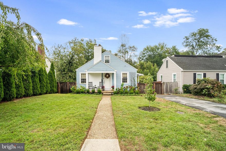OPEN SATURDAY OCTOBER 4, 2-4 pm. This charming Cape Cod in the Hillwood subdivision offers a blend of classic design and modern amenities. With 3 bedrooms all on the main floor, and 2 full bathrooms, the recent updates and stylish interior make this a fall in love home...  at a great price point to own a home just a few blocks from Falls Church City.  Azalea Park is 2 blocks away. Features of the home include an upgraded kitchen with refaced cabinets, updated countertops, and a new SMEG stove 2025. Dishwasher 2022 and refrigerator 2024. Thoughtfully remodeled bedrooms were altered in 2024 allowing for a larger primary with built in cabinets, drawers and wardrobe space.  The other bedrooms also have built in drawers and shelving.  In addition there is tasteful soft lighting, and cozy wood floors throughout this main level. Enjoy the warmth of a wood-burning fireplace/firebox with blower in the inviting living area, complemented by a dining area, again with custom built in cabinets, perfect for gatherings. The walkout basement comprises of an office/occasional bedroom, rec room and a good size storage room. The ceiling tiles were replaced with drywall on this level, and new ceramic tile flooring was installed in 2021.  There is a dedicated laundry /mud room with a dog shower. The upper level has a second office and play room: ideal additional versatile living or storage space. The exterior comprises of a picturesque side balcony for morning coffee off the kitchen, and a large rear patio that allows you to enjoy the beauty and relaxation of the  private fenced backyard. Expansive lawn for games and a recent shed was installed approximately 4 years ago for your bicycles or gardening tools and supplies and outdoor cushions.  (2nd small shed and hose attachment on side of house do not convey). The front yard has been newly landscaped in the last 3 months and there is a driveway for parking up to 2 cars for off street parking.  New HVAC system 2023.  New spray foam under roof space 2024. Replacement windows. Located in a vibrant community, residents benefit from nearby parks, Falls Church City amenities, library, community center and award winning farmers market. New Whole Foods in Falls Church City is a 0.7 mile away.  Short distance to Fairfax Hospital and the beltway.  East Falls Church metro approx 1 mile, W&OD Trail also 1 mile away. Don't miss this opportunity to own a charming home in a wonderful location!  Open Saturday October 4, 2-4 pm