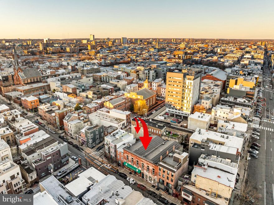 This offering presents a rare opportunity to acquire two contiguous CMX-2.5 zoned properties in the heart of Northern Liberties, combining stabilized income with long-term flexibility.
The portfolio includes the mixed-use commercial building at 209–215 Fairmount Avenue and the adjoining parcel at 705 N American Street, together providing a 7,550 SF combined footprint — a scale increasingly difficult to assemble in the neighborhood.
The property is leased through December 31, 2026 and produced $228,998 in total income in 2025. After full operating expenses, including property taxes, the asset generates approximately $203,500 in Net Operating Income, representing a 5.8% cap rate at the offering price.
The existing lease term provides stable income while a buyer evaluates long-term plans and pursues planning or entitlement work, with a defined transition point at the end of 2026.
The tenant has expressed interest in renewing; however, any future lease extension would be subject to negotiation with the new owner. This structure provides flexibility for continued income stabilization or repositioning following the current lease term.

Assemblage Overview
• 7,550 SF Contiguous Assemblage
• Two Parcels: 209–215 Fairmount Avenue & 705 N American Street
• CMX-2.5 Zoning – Mixed-Use Development Potential
• Located in Northern Liberties
• Income in Place Through 12/31/2026
• Defined Transition Timeline for Repositioning or Redevelopment

209–215 Fairmount Avenue (Primary Building)  MLS#  PAPH2482266

• Grand Second-Story Theatre Hall with Open-Span Volume
• Preserved Theatre-Era Allegorical Ceiling Panels
• 18’ Pressed Metal Ceilings with Decorative Cornice Detailing (Main Level)
• Original Interior Woodwork and Architectural Detailing
• Hardwood Flooring on Upper Level
• Full-Building Basement with 10’+ Ceiling Height
• Significant Ceiling Volume Rare for Buildings of This Era
• Adaptive Reuse or Conversion Potential

705 N American Street (Contiguous Parcel) MLS#  PAPH2452904

• Vacant Paved Lot (Separate Parcel)
• Secondary Access
• Enhances Assemblage Scale and Site Configuration Flexibility

Showings are limited to evenings after 6 PM and weekends to accommodate the current tenant. Virtual access available via 3D tour.