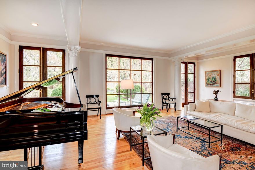 This stunning home in sought after Wesley Heights  blends traditional charm with architectural flair. Featuring six bedrooms, five and one half baths, off street parking and a spectacular garden this tasteful house truly has it all. The main level opens to a dramatic dining space with a double height ceiling.  The spacious living room is both grand and inviting with a fireplace, custom windows and French Doors that look out on the lush garden and swimming pool. The kitchen is modern and sleek complete with stainless appliances and a delightful eat-in space.  The second level offers four generous bedrooms and three updated bathrooms. The master bedroom has soaring ceilings, walk-in closets, an updated bathroom with soaking tub as well as a balcony with commanding views of the garden.  The upper level has a large and bright bedroom and a full bathroom. The lower level is fully finished with an independent entrance, large family room, bedroom, full bathroom and kitchenette. Shops, restaurants and numerous outdoor activities are all just steps away.