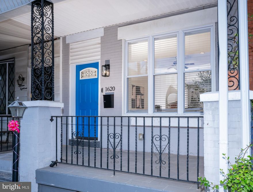 TAX ABATEMENT UNTIL 12/31/2028! This oversized two story townhome in Brewerytown is a gracious 15' wide and features high ceilings, recessed lighting, and hardwood flooring throughout. Step onto the covered front porch and into a large open concept living/dining/kitchen that greets you with three large front windows and an arched light on the front door. The living space is large and perfect for entertaining.  The ample dining area continues the theme with another window for added daylight. The kitchen is huge, with two more windows, white shaker-style cabinetry with crown moldings, ceramic tile flooring, white subway tile backsplash and light stone countertops. The black stainless appliances include a side-by-side refrigerator with ice and water dispensers, a 5-burner gas range with center griddle, dishwasher, and built-in micro-hood. The corner sink has a professional style pre-rinse pull down faucet and disposal. Beyond the kitchen is a mud room and powder room with another window. The rear patio has a colorful custom painted mural. The staircase has modern metal railings, wood treads, and exposed brick that continues throughout the upstairs hallway. The main bedroom en-suite has a bay window and tray ceiling. There are two ample closets and a ceiling fan.  The main bedroom bath has a fully tiled shower, gray tiled flooring, and white floating vanity. The second bedroom has a ceiling fan and can accommodate a queen-sized bed. The third bedroom at the rear is large, with four windows, a double-door closet, and ceiling fan. This room can also fit a queen bed. The hall bath is tiled, with bathtub/shower, storage vanity, window, and shelving. The laundry room has its own window and a stacked front-loading washer and dryer. This home has central air, is freshly painted, and ready to make it your home!