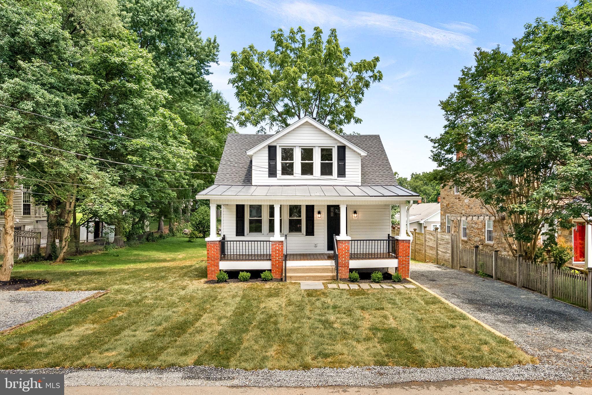 Welcome to 321 W J Street – A Fully Renovated Cape Cod in the Heart of Purcellville!
This charming, fully updated Cape Cod is ideally located close to downtown Purcellville and Fireman’s Field, offering the perfect blend of small-town charm and modern convenience. With easy access to commuter routes, local shops, and popular restaurants, you’ll love the lifestyle this location provides.
Step inside to discover 3 spacious bedrooms and 2 full bathrooms, thoughtfully designed for comfort and functionality. The main level features a welcoming family room and dining area, flowing seamlessly into a brand-new kitchen equipped with: Stainless steel appliances, Quartz countertops, Pot filler for added convenience, Coffee bar. Main-level washer and dryer. Step through the back door to enjoy your new composite deck, complete with sleek black aluminum railings, and take in the expansive side and backyard—perfect for relaxing, entertaining, or gardening.
Upstairs, you’ll find two additional bedrooms, including a spacious primary suite with a large closet, a second bedroom, and a beautifully renovated full bathroom.
Every detail has been carefully updated in 2025, including: New roof, Plumbing, Electrical, Mini-split HVAC systems, And much more! Don’t miss the opportunity to own this move-in-ready home in one of Purcellville’s most desirable locations!