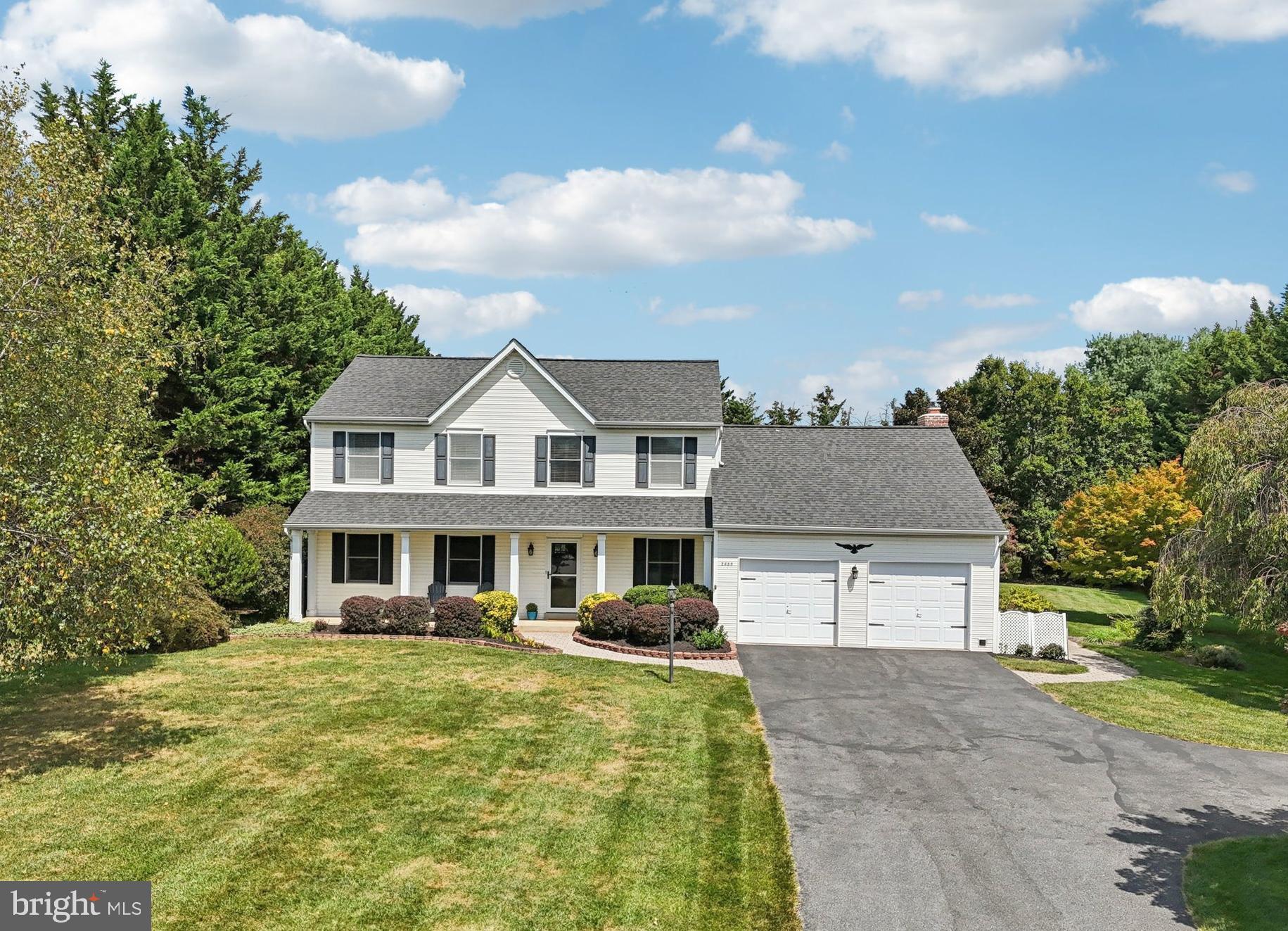 Welcome to this beautifully updated home that blends modern comfort with timeless charm. The main level features a formal dining room with elegant wainscoting, a spacious living room with abundant natural light and gleaming hardwood floors flowing throughout, complementing the crown molding and classic finishes. The kitchen has been tastefully updated with stainless steel appliances, white cabinets, and granite counters and opens to a comfortable dining area and family room designed for everyday living and entertaining. Upstairs, you’ll find generously sized bedrooms with neutral paint and new carpet, including a spacious primary suite highlighted by a wood accent wall, walk-in closet, and a luxurious en suite bath featuring a dual vanity, updated countertops, and a glass-enclosed shower with custom tile. Secondary bedrooms are bright and inviting, served by stylishly updated bathrooms. The lower level offers a alrge open rec room for added living space or entertaining and a flexible storage and a workshop area, ready for hobbies or projects. Outside, enjoy a large yard with mature trees that line the backyard and space to relax or play. You'll love spending time around the heated in-ground pool with lots of patio space or spending the evenings taking in the scenery on the hardscaped patio. Located in a desirable area with no HOA and easy access to commuter routes, shopping, and schools, this home is move-in ready and waiting to be enjoyed.