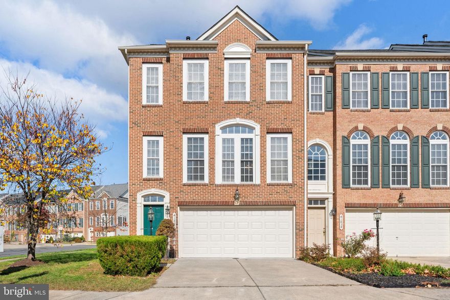 This elegant three-level, three bedroom, three and a half bath, end unit townhome features a two-car attached garage and boasts crown moldings and wainscoting in various rooms, including the dining and living areas. The open and bright living and dining spaces provide easy access to the kitchen and other levels. The upgraded kitchen offers a casual dining area and an island with bar stool seating, as well as stylish hazelnut bamboo floors making it an ideal entertainment space. Maple cabinets, granite countertops, and stainless steel appliances enhance the room's appeal.

Upstairs, two front bedrooms share a hall bathroom, and a spacious master suite offers a high ceiling, walk-in closet, and a well-appointed master bathroom. The lower entry level features a tucked-away recreation room with crown moldings and wainscoting, a third full bathroom, a laundry room, a gas fireplace and access to the two-car garage.

Many upgrades include kitchen flooring three years old, refrigerator three years old, washer three years old, HVAC five years old, carpet three years old.

Kirkpatrick Farms amenities include community pool, playgrounds and tot lots, tennis and basketball courts, and a club house. Close to grocery, shopping, and the Dulles airport.