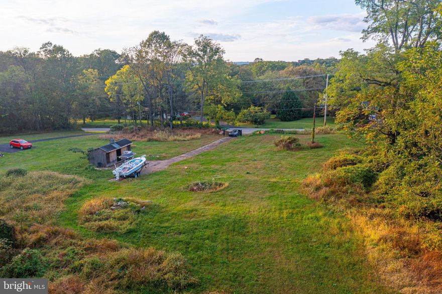 1.84 acre mostly cleared parcel of land with existing well and per approved for septic.  This is the perfect building lot to build your dream home!