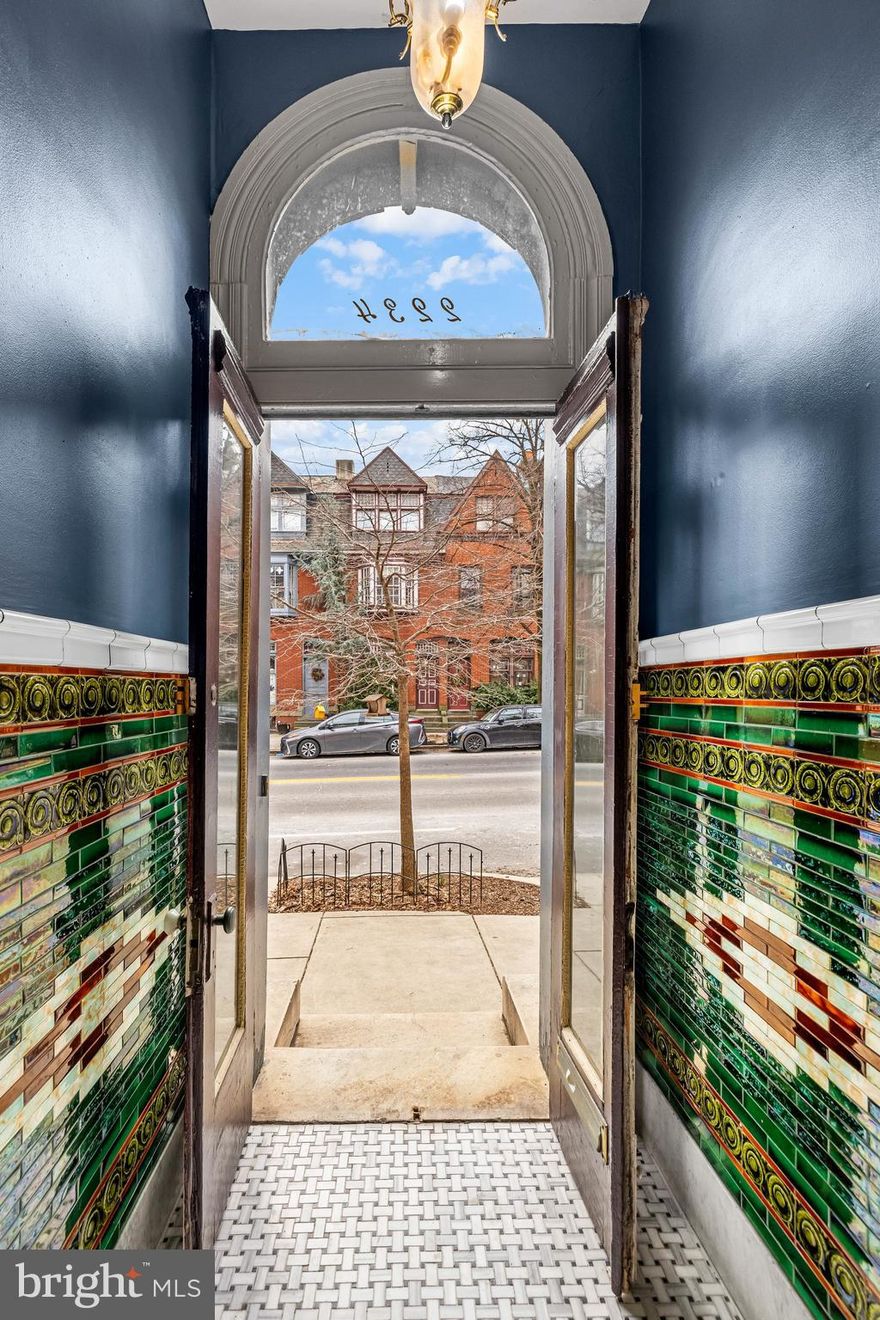 Don't miss this rare inventory! This classic Butchers Hill row home is an end-unit, with parking, steps from Patterson Park. It is large- 2,671 square feet above grade- plus has as large, unfinished basement with great ceiling height. This historic home full of charm and original details has been modernized with 2 zone heating and air conditioning systems (2 new condensers), 2 water heaters,  a new roof, and a fantastic recently updated roof deck with spectacular views. The main level has a large living room with gas fireplace, an eat-in kitchen, a powder room, a dining room, and a mudroom with bathroom. The home has wood floors throughout with special inlay details on the main level. Upstairs, on the second level are three sizable bedrooms with two full baths. The rear bedroom opens to a covered balcony. The third has a huge front room, a sizable rear area (all open/loft style), a full bath and opens to the lower deck leading to the roof deck. This location is very walkable to the downtown Hopkins campus, the waterfront, and area favorites such as La Barrita, Marta Fine Foods, Water for Chocolate, Charmed Kitchen, Patterson Public House and Ministry of Brewing.