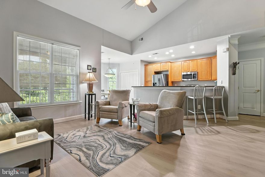 Welcome to the exquisite penthouse level sanctuary at 1507 Broadneck Place, Unit 404, Annapolis, MD. This elegant loft-style condominium, offering 1,235 square feet, is a testament to comfort and convenience. Revel in the grandeur of vaulted ceilings and the abundance of natural light that cascades through expansive windows, enhancing every corner of this remarkable home. Thoughtfully designed, the unit features two bedrooms, two luxurious bathrooms, updated appliances, and chic luxury vinyl flooring throughout. The loft offers additional space for relaxing, working, or entertaining. 

Relax on your private balcony, a serene retreat for quiet evenings. Enjoy afternoons poolside at the community pool, just a short walk around the corner.  The community enriches your lifestyle with a suite of amenities, including an elevator, gym, billiards room, and game room, ensuring every convenience is within reach. Experience unparalleled living in this refined oasis.

Easy access to Rt, 50, shopping, dining, entertainment, and recreation, makes this a highly sought-after 55+ community in Annapolis.