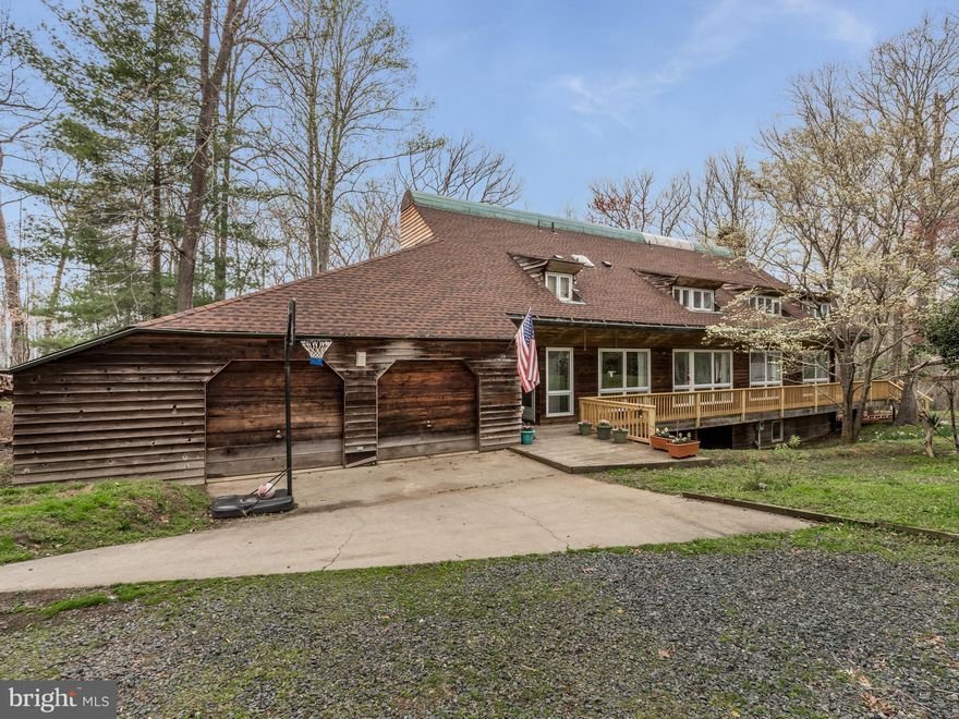 Such potential and opportunity for you on this custom built home with architect plans to give the look of  a ship. So many features to list for you! Basement is unfinished. Oversized 2 car garage with breezeway to front door and front and back decks. House overlooks the woods and is very peaceful. Primary suite has sitting room or office over garage and has large closet and full primary bath with big shower area. 3 Upper level bedrooms are all good size and there is more storage in the attic area! Open floor plan on main level with doors for access to the lovely yard and nature.  Over 82 ft of decking in front and then over 100 ft of decking behind garage and rear of home around to the side yard. Plenty of room for outdoor living and entertaining. Retaining wall near driveway for additional parking. Wood floors in much of the main level and wood fireplace. Separate laundry room.  Newer roof, Newer HVAC (both units) in the last 5 or so years.