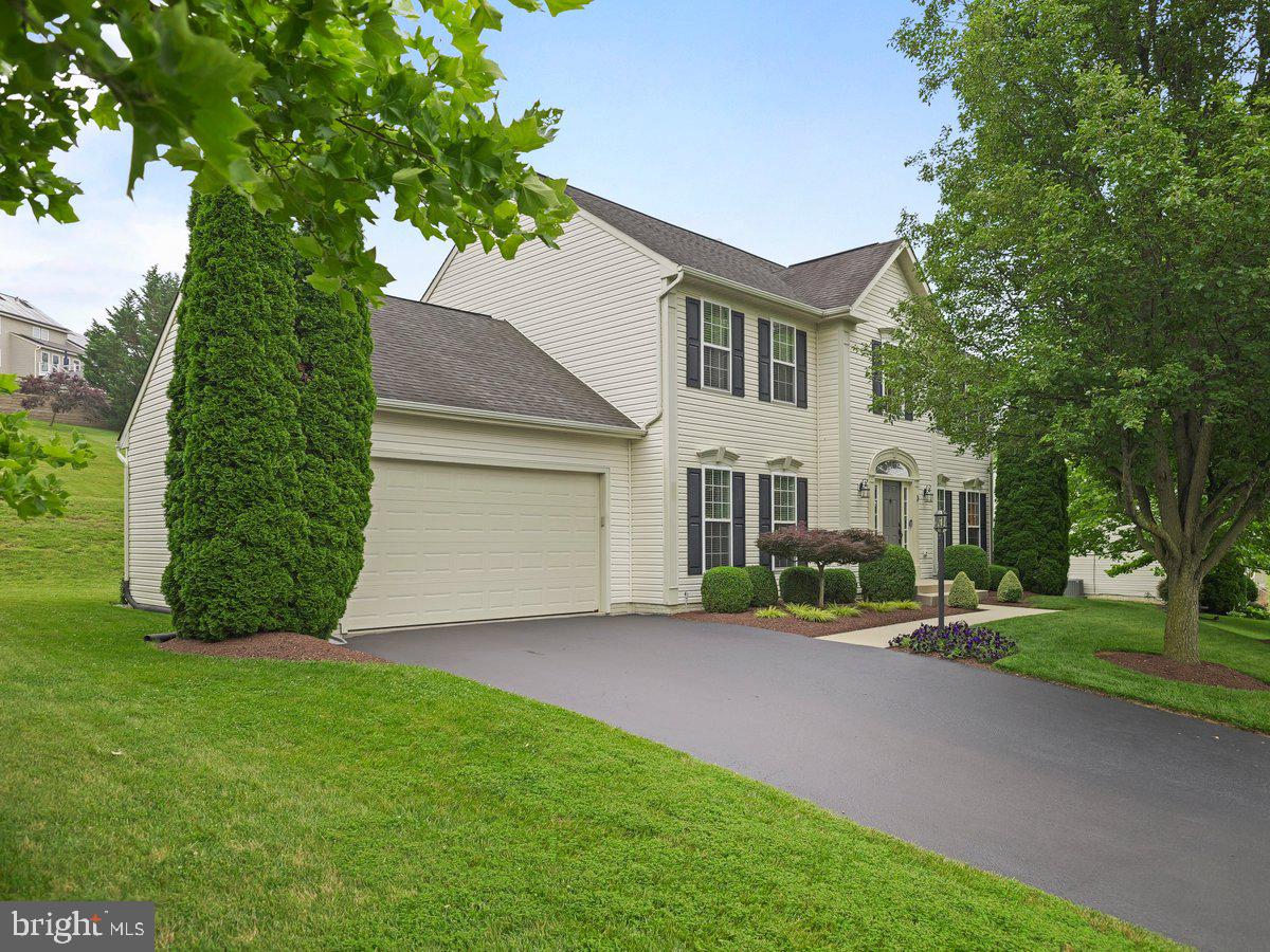 A MUST SEE! Easy to show!
Welcome to 3 North Pointe Terrace, a stunning home located in the highly desirable North Pointe community of Middletown, MD. This impeccably maintained property offers five spacious bedrooms and three and a half baths, combining comfort, style, and functionality. Recent upgrades include dual HVAC systems replaced in 2024. Driveway resealed (2025).
Step into the inviting two-story foyer with a beautiful turned staircase leading to the upper level. Gleaming hardwood floors flow throughout the main level, creating a warm and elegant atmosphere. The gourmet kitchen is truly a chef’s dream, featuring an abundance of cabinet and counter space, a huge center island with breakfast bar, newly updated quartz countertops, and newer stainless-steel appliances including a double wall oven and five-burner gas cooktop. A separate pantry offers even more storage. The kitchen opens to a bright breakfast room filled with natural light, which leads to a large family room with custom blinds, newer carpeting, and a cozy gas fireplace.
For more formal gatherings, there is a separate dining room complete with crown molding and chair rail, as well as a spacious living room that could easily be used as a home office. A convenient main-level laundry room is located just off the kitchen.
Upstairs, newly installed hardwood flooring runs through the hallway, leading to a luxurious primary owner’s suite with newer carpet, a walk-in closet, and an updated en-suite bath. The bath features a soaking tub, walk-in shower, newer designer tile, and a dual-sink vanity. Three additional generously sized bedrooms share a beautifully updated full hall bath.
The finished lower level offers even more living space, including a large recreation room with new laminate flooring, a fifth bedroom or bonus room, and a full bath with walk-in shower. There is also walkout access to the backyard, making it ideal for entertaining or multi-generational living.
Outside, you will find rear back yard great for pets and a newly installed stamped concrete patio just off the breakfast room, ideal for relaxing or hosting guests. The two-car attached garage has painted drywall and provides plenty of storage.
Best of all, there is no HOA, and the home is located in the highly acclaimed Blue Ribbon Middletown school district. Enjoy everything Middletown has to offer, including local favorites like The Main Cup, Dempsey’s Diner, and Tapas on Main, as well as nearby grocery stores, gas stations, and Richland Golf Course. You are just minutes from Interstate 70, making commuting easy and convenient.
Do not miss this incredible opportunity. This home truly has it all!