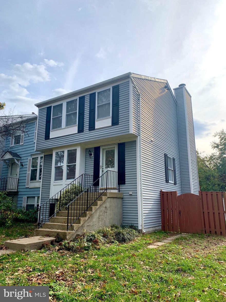 Updated end unit townhouse in the Stone Crossing community!   Lower level features a full bathroom,  walkout to yard, fireplace. Main level features living room, dining room, large kitchen, deck, powder room. Great location close to I66 and route 28, shopping centers, etc.