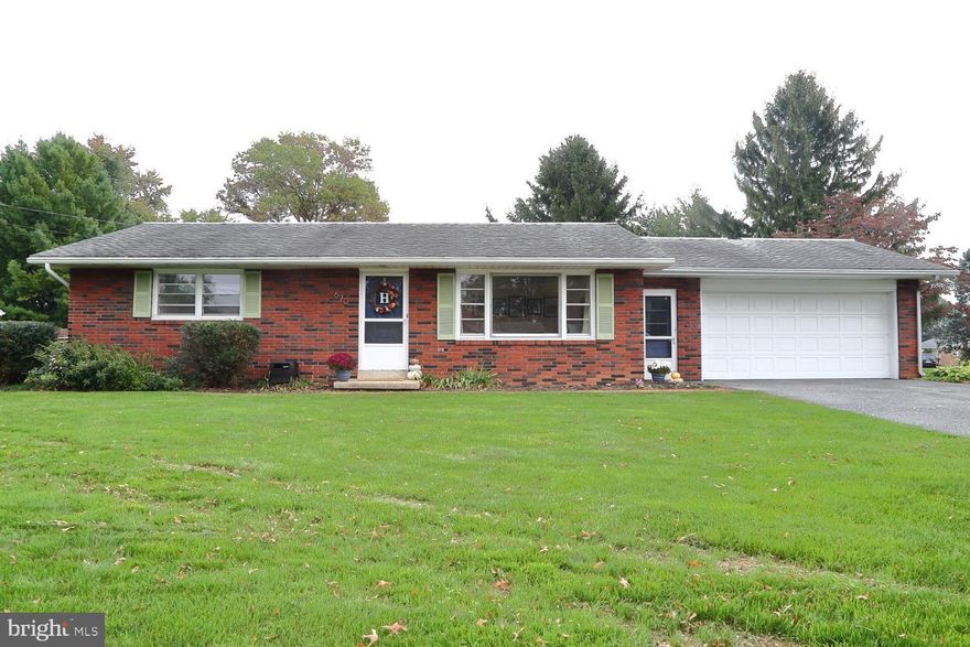 Consider this delightful ranch style home just  minutes from downtown  Mount Joy. As you enter you will feel  the spacious living room full of natural light. Gleaming hardwood floors thoughtout the main level. The kitchen is great too with plenty of cabinets, and a generous  eating area for the family. Relax in the sunroom overlooking the huge flat yard and pavered patio area. A place for those  enjoyable picnics and gatherings or just space to run around. The lower level was just recently finished creating some additional rooms, a family room, office area or possibly a bedroom, plus a full bath including a tile shower not to mention  a workshop and laundry/furnace room. Thoroughout this property you will notice numerous pleasant upgrades, see seperate list.  Off from the kitchen is the 2 car garage with opener and an access door to the back yard. Why not start building your memories in this very accommodating, warm  home.