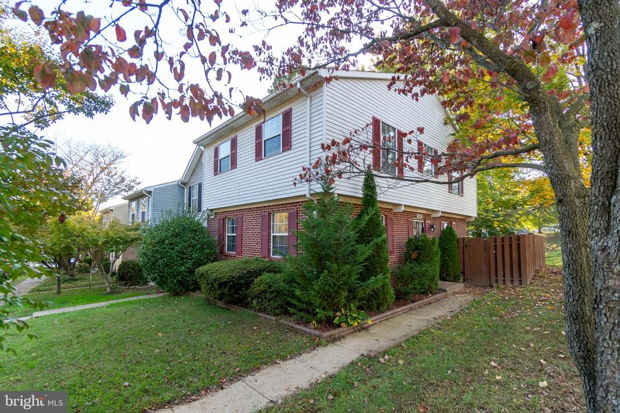Welcome Home!  This turnkey 3-bedroom, 2.5 bath end unit townhouse is freshly painted and features brand new floors throughout!  The kitchen showcases stainless steel appliances, white cabinetry, granite countertops, modern pendant lighting and an island with BONUS storage space.  The kitchen flows right into a gracious eat-in dining area, making this extended space,  great for entertaining.  The spacious living room highlights contemporary crown molding and oversized French doors which provide beautiful natural light and leads out to a fenced in backyard. The private yard comes with a paved patio and a designated area for gardening or landscaping.   The generously sized primary bedroom boasts great closet space with both a double and walk-in closet , as well as, its own full private bathroom.  All bathrooms have been updated to include updated vanities.   All bedrooms, family room and dining area feature ceiling fans!   This home offers great storage throughout including an attached exterior storage shed!  Located near shopping, restaurants (Potomac Mills Mall, Stonebridge & Historic Occoquan), I-95 and commuter options!  This Gem is a must see!!!