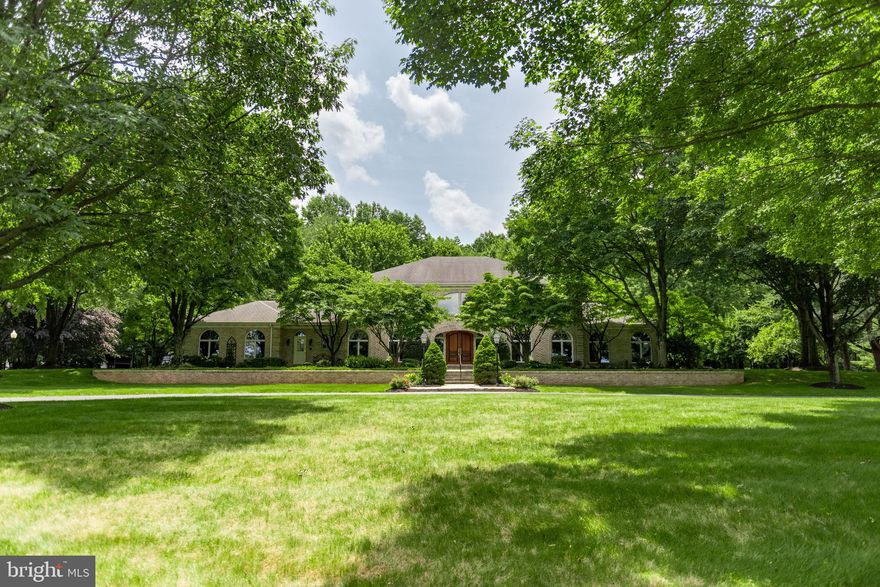 Your dream home awaits! Stunning custom built 100% brick home located on over 11 acres with spectacular views. As you approach the home, you'll drive down a private lane to be greeted by this grand manor. The stately home has mahogony front doors, a two story foyer with marble floors and custom a double staircase. It will lead you to the spectacular, open plan kitchen and family rooms where loads of natural light and a view of the pool encourage friends and family to gather. The granite countertops, double ovens and walk-in pantry will please the chef in the family. Enjoy quick meals at the kitchen  island  or sit at the kitchen table at the bay window. The space flows into the sitting area and spacious family room with a cozy gas fireplace, making entertaining a breeze. The formal dining is well designed with built -in shelving and marble inlay ideal for serving. It will be a fantastic space for holiday meals or hosting dinner parties. Working remotely? Enjoy Two Home offices in a separate wing of the home! The first office is distinguished with built-ins and walnut walls and gorgeous views of the grounds. The second office offers an adjacent room with built-in cubbies- great for storage and organization. Drop your backpack or your shoes in the sizable mud room. Retire to the first level primary bedroom where an ensuite and exercise room and very ample closet space will please most shoppers. Read a good book in the living room or relax in the sunroom. A laundry room and two half baths round out the first level.  The second level has two Very Large bedrooms each with its own full bath and walk-in closet. The finished portion of the lower level has over 1,800 SqFt, a gas fireplace surrounded by beautiful stone, a full kitchen and a full bathroom. It is a great space for watching the big game or hang out with friends. The unfinished area will be ideal for seasonal items and holiday decor. You can never have enough storage! The heated, oversized three car garage will keep your vehicles warm and dry. Enjoy outdoor living? Host a barbcue on the back patio and  enjoy hours of fun in the saltwater pool.  Every detail of the home, both inside and out, was thoughtfully curated. Located approximately 5 miles to Hershey Medical Center and close to the schools, the airport, and highways with good access to Lancaster and Harrisburg.  Prepare to be impressed by the timeless beauty of the home and  over 11 acres of professionally manicured grounds.