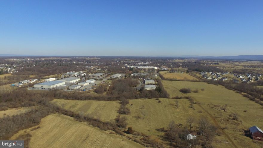 Prime Development Opportunity | 122 Acres Adjoining Industrial Park
Future Potential: Strategically located for value appreciation, with an estimated post-rezoning value multiples of the current asking price.
Planning & Annexation: Property is currently zoned AOC and has been officially adopted into the Berryville Area Development Authority (BADA) plan for future annexation by the Town of Berryville and Clarke County.
Key Features: Adjoins the existing Clarke County Industrial Park and includes a large historic bank barn.
Important Note: The existing house is unsafe for entry. Showings are by appointment only