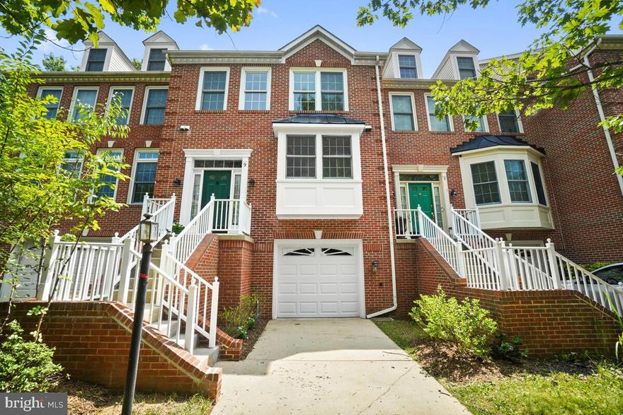 Beautiful, four story brick front townhouse features 3 bedrooms, 3.5 baths and 1 car garage. Large kitchen, open concept dining and living room, and french doors with access to a deck. Refinished hardwood floors and new carpet in main and upper level. Primary bedroom features  vaulted ceiling and walk-in closet, en suite bathroom with double sink vanity, soaking tub, and separate shower and 4th floor loft with skylights. Lower level is fully finished with full bath, fireplace, laundry, garage access, storage and french doors to walk out to backyard.  New Roof in 2018. Neighborhood offers playgrounds, tennis courts, basketball court, well maintained green space and walking paths. Located near major commuter routes, public transportation, shopping and restaurants.