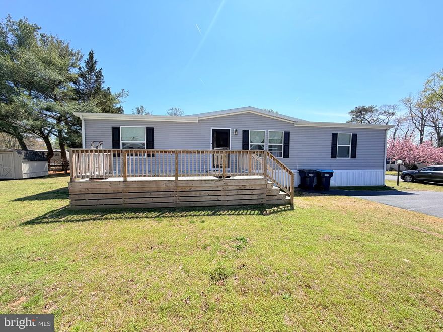 This charming and cozy three-year-old home offers easy, modern living in a well-designed 3-bedroom, 2-bath double wide. The open floor plan makes the space feel bright and welcoming, with the kitchen at the heart of the home. It opens seamlessly to both the breakfast area and living room, making it perfect for everyday living and casual entertaining.

The primary bedroom is thoughtfully located on one side of the home for added privacy and features two spacious closets along with its own private bathroom. On the opposite side, you’ll find two comfortable secondary bedrooms and a full bath they share.

Step outside and relax on the front porch /deck while enjoying morning sunrises or peaceful sunsets. This well-kept, nearly new home is move-in ready and waiting for you—schedule your tour today and come see it for yourself.