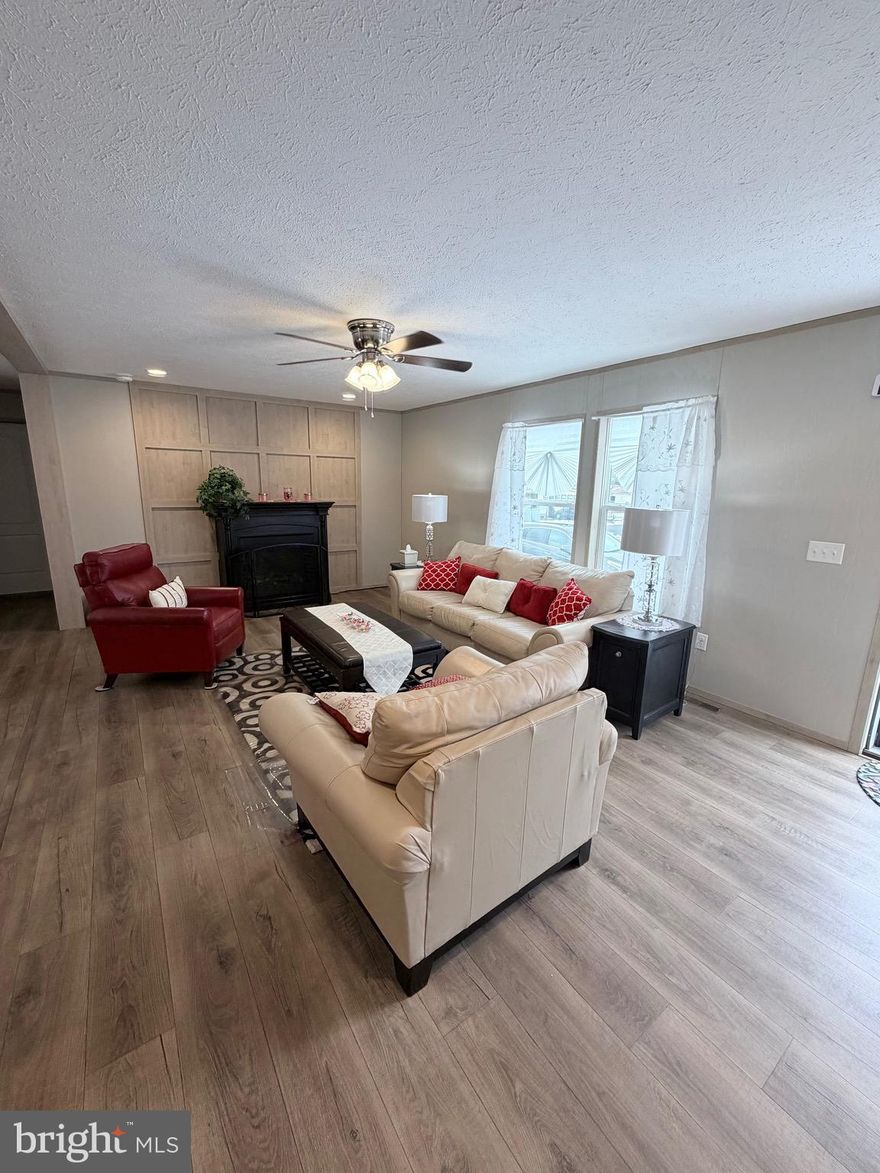 This charming and cozy three-year-old home offers easy, modern living in a well-designed 3-bedroom, 2-bath double wide. The open floor plan makes the space feel bright and welcoming, with the kitchen at the heart of the home. It opens seamlessly to both the breakfast area and living room, making it perfect for everyday living and casual entertaining.

The primary bedroom is thoughtfully located on one side of the home for added privacy and features two spacious closets along with its own private bathroom. On the opposite side, you’ll find two comfortable secondary bedrooms and a full bath they share.

Step outside and relax on the front porch /deck while enjoying morning sunrises or peaceful sunsets. This well-kept, nearly new home is move-in ready and waiting for you—schedule your tour today and come see it for yourself.