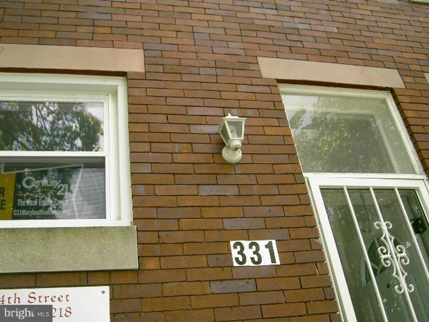 WOW!WOW! What a great time to buy an inviting 4BR 1BA townhouse in the revitalize GUILFORD,CHARLES VILLAGE AREA.property were renovated in 2007 can be used as a living assistance property or bring your extended family.Hardwood floors on the first floor with a den or office.MOVE IN READY COME AND SEE YOU WANT BE DISAPPOINTED. APPLIANCES ARE AS IS CONDITION. SELLER IS VERY MOTIVATED.