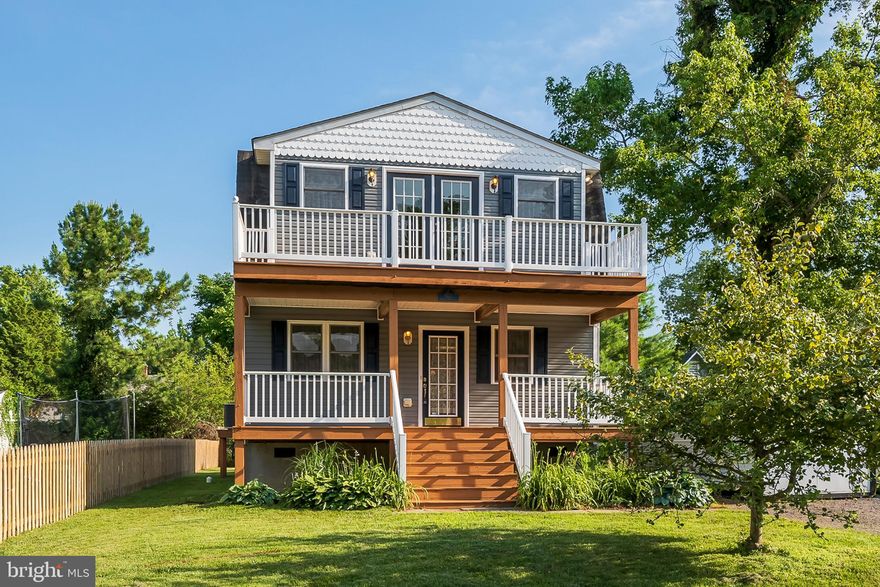 Just steps away from the Community Water Front, boat slips and park. Built in 2005 only 14 years old. Hardwood floors through out the whole home, double decks with nice Water View!! Open floor plan, separate laundry room and storage, Master Suite with full bath and soaking jetted tub. New french doors off the Master to private balcony with Water Views, Community offers boat slips, Club House and Water Front Park and Piers. Please note the house next door should be gone soon!!