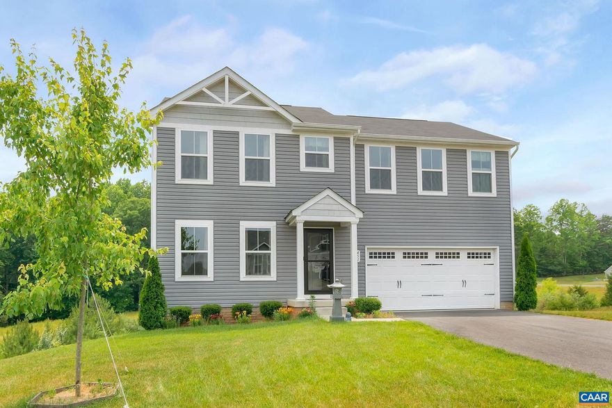 Welcome to this delightful home conveniently located near Route 29 in Greene County. Situated on a great lot backing up to woodlands , this 4 bedroom, 2.5 bath home enjoys minimal energy costs thanks to solar panels.  The main floor is open concept living, with a powder room and an office.  Upstairs are the bedrooms, full baths, and laundry -washer and dryer less than a year old.  Primary suite has walk in closet.  There is room to expand in the unfinished basement which includes rough in plumbing and walk out access to backyard.  The kitchen features: stainless steel appliances, island and separate dining area. Spacious 2 car garage.   Minutes from NGIC, North Fork Research Park and Charlottesville.,Formica Counter,White Cabinets