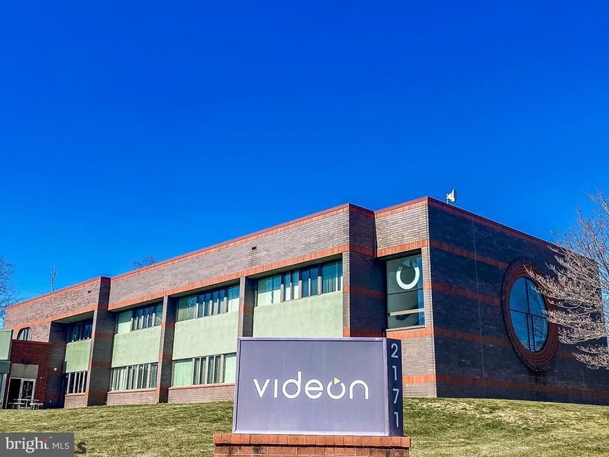 A unique property with 10,000 sf of manufacturing built in 2008 along with 17,000 sf of office in a 2-story building constructed in 1993.  The 2 buildings are wisely linked together with a high-end wing full of employee amenities such as a cafeteria with a full-sized, commercial kitchen for tantalizing staff meals; a very large dining room/large meeting room with copious amounts of light perfect for break-time or all-staff meetings; a spacious outdoor dining area to soak up the sun between projects; a workout area to assist in living a healthy lifestyle, 2 restrooms with shower facilities, a movie theater to preview product marketing videos, and a game room just for fun.  The 10,000 sf manufacturing building has 3-phase electric, 200 V, 120 amp service to the facility, natural gas, and fiber optics. There is a 200-amp, Generac generator; a dry, fire-suspension system, and a hood system. The ceilings are 15' to the deck and 11'6" under the HVAC ducts for oversized equipment. There are 2 standard, double garage doors and a single, commercial garage door for all your loading needs.   The office space is 2 floors with a good mix of large open areas, conference rooms, and individual offices. A newly remodeled, large workroom surrounded by windows is a coveted place to work. Total listed square footage is approximate and should be verified by Buyers and/or their agent.