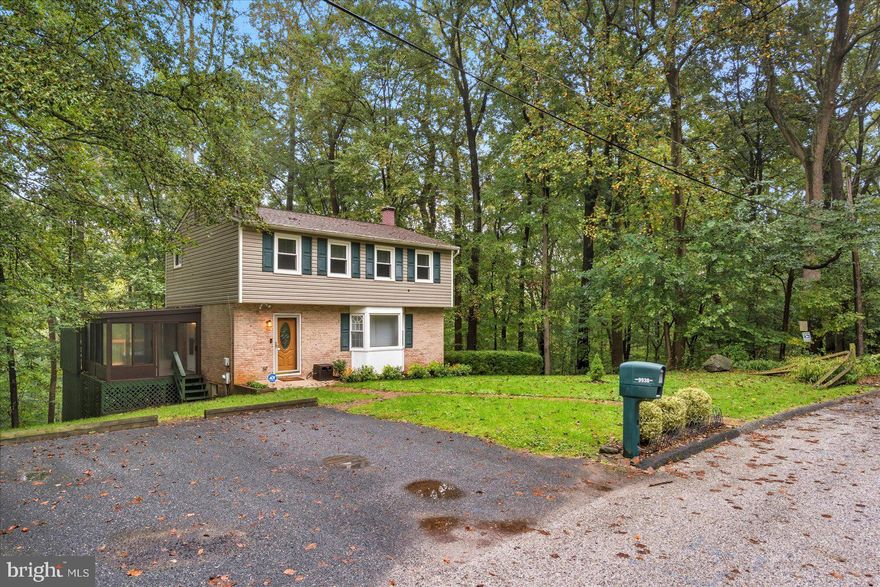 The Nature Enthusiasts Paradise Best Describes this 3 Bed / 2 Full / 1 Half Bath Brick Colonial. This home is the last home on the street that backs to Gunpowder Falls State Park and Big Gunpowder Falls. The home provides total seclusion and tranquility at it's back deck for everyone to enjoy every season. The home boasts hardwood floors on the main level, a large family room, separate dining room and an eat in kitchen along with a half bath. The side 3 season room offers additional outdoor space that leads to the large deck overlooking Natures Best Views. The upper level provides Hardwood Floors under the carpet, 3 bedrooms to include the primary bed & primary bath with walk in shower. The 2nd full bath offers a deep jetted tub and river rock floor. The lower level is completely finished with dual slider walk outs to the back fenced yard. The lower level also offers a brick wood burning fireplace for those winter days and nights. The lower level has its own laundry area and a separate furnace room. The roof, siding and windows are newer and offer the ease of mind for the next owner. The Lennox oil fired furnace is newer and the A/C Coil and Condenser is new in 2021. Hot Water Heater 2024. The home has been well kept for many years and is awaiting the next owner to enjoy peace and tranquility that this home and property offers!!!