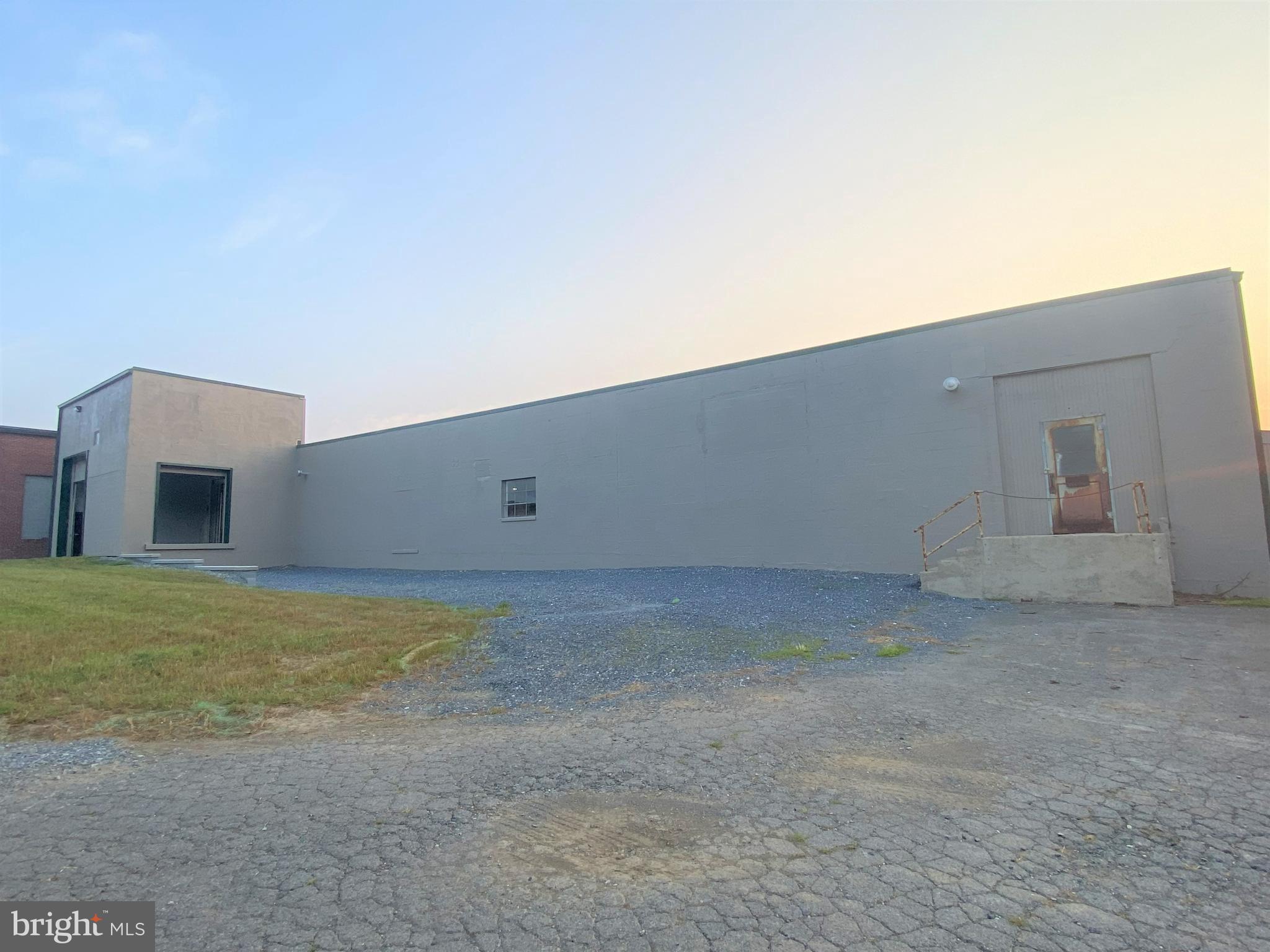 About 18,000 SF of warehouse space with 16'- 18' clear ceiling height, 480 - 3 phase electric, 2 - 10' x 14' grade level door and a new dock door. New LED lighting throughout and freshly painted walls make is bright and light. Many uses in the PC-1 zone to include contractors, manufacturing, commercial, industrial or general warehousing. Car related uses is a natural fit with the existing co-Tenants and location. Zoning ordinance under documents. New ownership looking to fill space at a reasonable cost. NNN lease where Tenant pays CAM and separately metered utilities. New Gas heat units as well. No office build out included but can be added. This space is currently designed as heated storage.