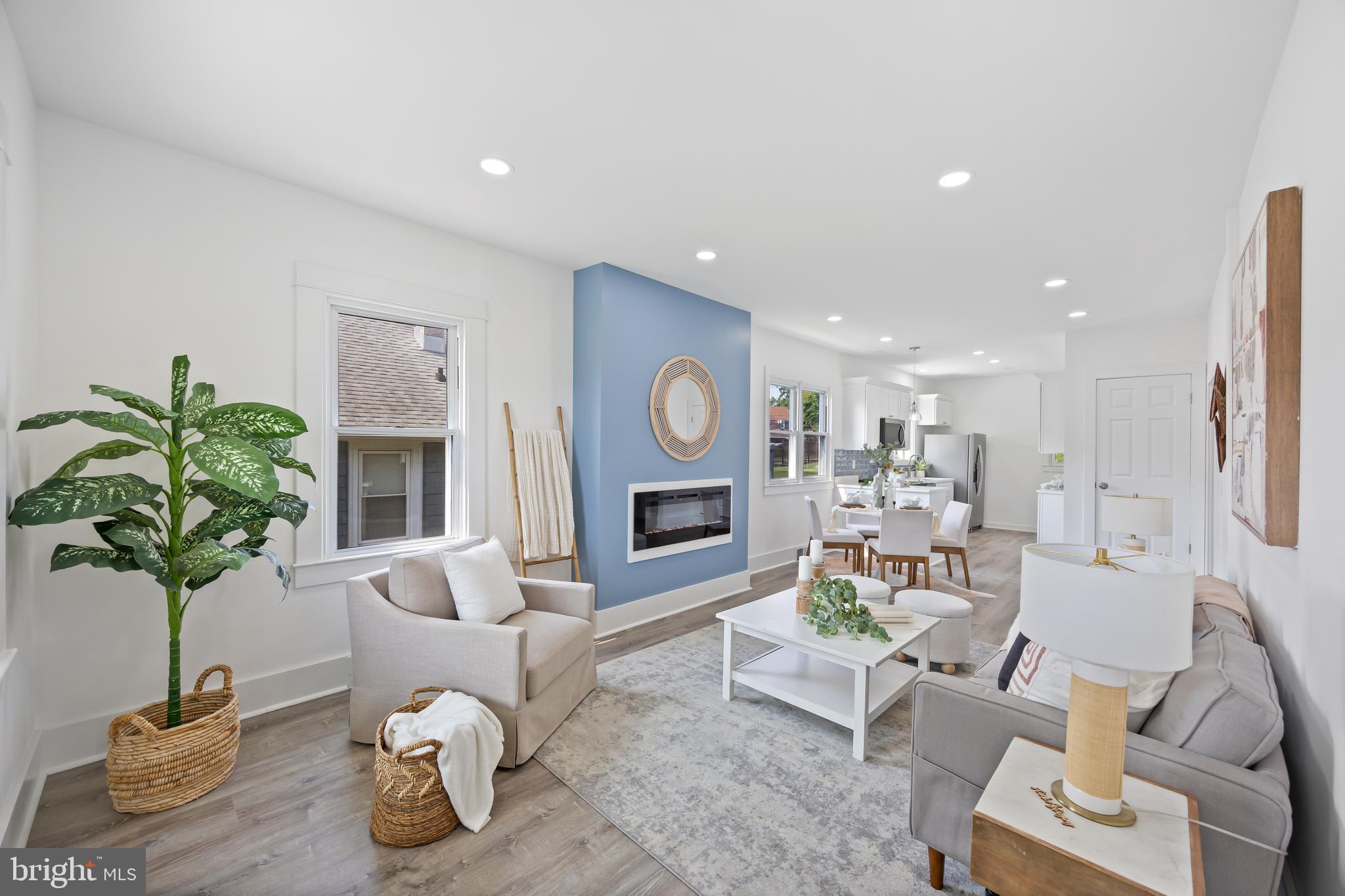 Welcome home to this gorgeous full renovation!
No detail has been overlooked where modern upgrades meet cozy charm. Starting with fresh updates to the door, porch, and landscaping, this home makes a great first impression.
Step inside to a bright, open-concept living area that seamlessly combines the living room, dining space, and kitchen into one inviting hub. Set the mood with the new electric fireplace—all the cozy vibes at the push of a button, no work required!
The kitchen features sleek stainless steel appliances, beautiful quartz countertops, brand-new cabinetry, and durable LVP flooring—perfect for entertaining or weeknight dinners.
The main-level primary suite offers the rare convenience of a private ensuite bath, providing comfort and accessibility all on one level. A second main-floor bedroom adds flexibility for guests, family, or a home office. The hall bathroom has been completely remodeled, blending classic black-and-white tile with new finishes including a modern vanity, tub, and mirror.
Head downstairs to a refinished lower level with exposed joists, recessed lighting, and a stylish yet relaxed vibe—ideal for hosting or movie nights. This level includes a second living space, an optional bedroom or office, a remodeled full bath, and a spacious laundry/utility room with ample storage.
Upstairs, fall in love with the huge third bedroom—a quiet, peaceful retreat that easily adapts to your needs, whether it's a sleeping sanctuary, playroom, or creative space.
Outside, enjoy a nearly fully fenced-in backyard—perfect for entertaining, pets, gardening, or just relaxing in your own private oasis. With a brand-new HVAC system, you’ll enjoy efficient comfort year-round.
Located in Baltimore County, 3 Greenwood Ave offers a rare combination of style, space, and convenience.
Schedule your tour today and fall in love with your next home!