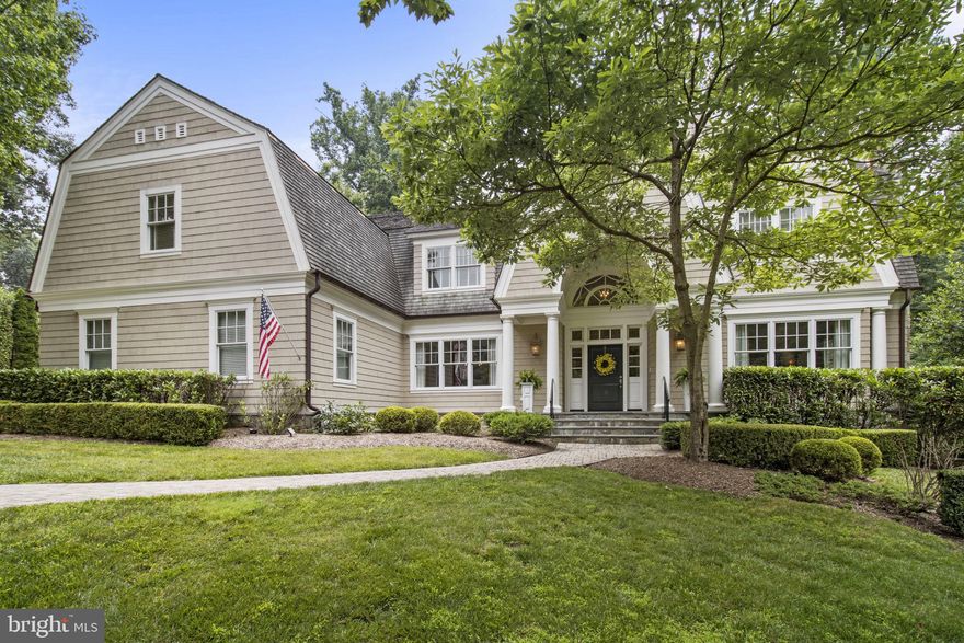 Stunning custom home sited on a prime .74-acre cul-de-sac lot in the idyllic Merry-Go-Round Farm community. This prestigious neighborhood boasts 81 custom built homes on a sprawling 204-acres, offering an equestrian center with groundkeepers and barn staff, miles of hiking and riding trails and views of the Potomac River. 

A two-story foyer welcomes you to the spacious, thoughtfully designed interior offering hardwood floors, lofty 10’ ceilings, beautiful moldings and 10kw backup generator. Gracing the foyer is the formal living room with marble fireplace and formal dining room, each with walls of windows. The hall gallery leads to the grand family room with raised-hearth fieldstone fireplace, coffered ceiling, and multiple French doors leading to a covered patio.  You’ll be delighted to cook and entertain in the gourmet kitchen equipped with six-burner Thermador range, oven, warming drawer, two dishwashers, desk area and large breakfast area all accessible to the large Ipe deck and back yard. Completing the main level is the private office with beautiful cherry bookcase, cabinetry and trim work A butler’s pantry and convenient mudroom with custom built-ins, side entry, second powder room and leads to oversized 3-car side-entry garage.

An elegant front staircase, as well as a private back staircase, leads to the Upper Level. There is a large guest suite with ensuite bedroom and sitting room, two additional large bedrooms with walk-in closets and bathrooms and an upper level study/library area great for homework station or second office space.  A true retreat, the exceptional primary suite features a tray ceiling, two large walk-in closets, a spacious sitting area with French doors leading to a private covered porch….the perfect spot for morning coffee….and a spa inspired bath with soaking tub, dual vanities, large shower and separate toilet room. 

The walk-out lower level complete with over 2,200 finished square feet is yours to enjoy hours of entertainment. The recreation and game area with fieldstone raised-hearth fireplace has French doors to the backyard. Enjoy watching movies and sporting events in the tiered home theater,  serve drinks and snack in the wet bar and stay healthy  in the spacious gym.  Rounding out the lower level is a 5th bedroom, full bath, and two large storage rooms. 

Located in the highly rated Churchill school district, offering easy access to the restaurants and shops at Potomac Village as well as major commuter routes. With its beautiful custom features, spacious layout, and desirable amenities, this is a truly remarkable home in an exclusive community.