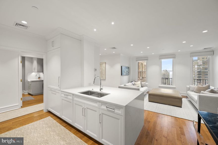 This beautifully renovated 2-bedroom, 2-bathroom at Rittenhouse Plaza offers approximately 1,545 square feet of living space with stunning, unobstructed views of Rittenhouse Square. Fully renovated  in 2023 by Weaver Luxury Living and designed by Kass & Associates, this home blends modern convenience with timeless style. The spacious living room is filled with natural light and offers serene views of the park. The adjacent open kitchen features custom Artcraft cabinetry by Spoque Kitchens, quartz countertops and backsplash, high-end appliances (including a built-in paneled refrigerator), and a hood with exterior venting. Its seamless connection to the dining area makes it ideal for both entertaining and everyday use. The primary bedroom suite includes a private bathroom with high-end finishes and a walk-in closet. The second bedroom also features a walk-in closet, custom wall-mounted bookshelves, and easy access to the second full bathroom. Additional features of the apartment include crown molding, updated doors with brass hardware, custom shades, and a built-in walnut dry bar. A laundry room with a wash sink and exterior-vented dryer adds functionality. The home is equipped with an independent heating and cooling system, soundproofing, a sprinkler system, and all-new electrical wiring. Rittenhouse Plaza, one of Philadelphia’s premier New York-style pre-war buildings, offers a pet-friendly environment with 24-hour concierge service and a landscaped courtyard. The building is well-maintained and known for its helpful and welcoming staff. Its prime location puts residents steps away from the vibrant offerings of Rittenhouse Square. The monthly co-op fee includes real estate taxes, Fios cable, internet, water, sewer, and building maintenance.   Parking is available for rent in several nearby lots.  This is a rare opportunity to own a fully updated and customized home in one of Philadelphia’s most desirable addresses.