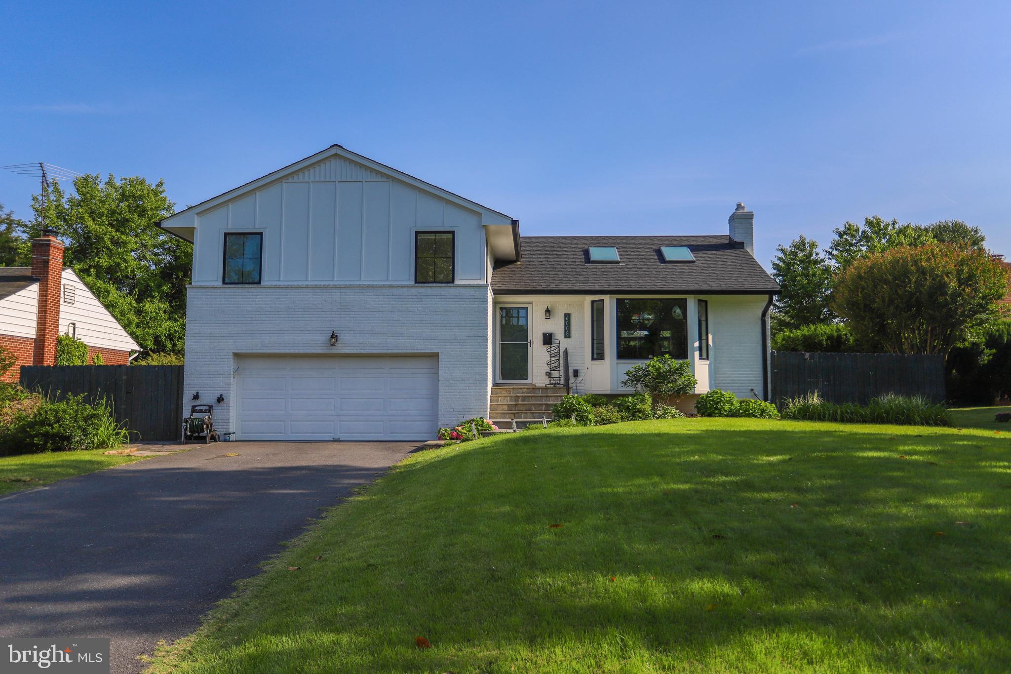 This fully renovated, open-concept Craftsman home in the prestigious Whitman school cluster blends modern elegance with timeless charm. Originally transformed in 2022 with a complete, high-end renovation, the current owners have since invested over $100,000 in additional enhancements—making this luxurious home truly move-in ready.
2022 Renovation & Recent Upgrades:
Exterior: New roof, James Hardie siding/soffits; Miratec trim; new front/rear gable roof overhangs; new 6” gutters, 4” downspouts; asphalt driveway; flagstone walkway.
Flooring: New 3/4” oak random-width (4/5/6”) flooring, sanded on-site; oak-like vinyl plank in den; plush carpeting in lower-level bedroom/rec room.
Windows & Doors: Pella double-pane windows (aluminum-clad exterior, wood interior); new fiberglass/glass exterior doors; Velux skylights; two-panel wood interior doors with modern hardware.
Kitchen: Shaker cabinets; 9ft waterfall-edge island; KitchenAid stainless appliances (refrigerator, 36” six-burner gas range, dishwasher, vented hood); double pantry.
Bathrooms: Four updated baths, Kohler faucets, Toto toilets.
Plumbing & HVAC: New PVC/CPVC piping; Mitsubishi HVAC split system; upgraded ceiling insulation.
Additional Features: Glass family room with vaulted ceilings, wood-burning fireplace, French doors to deck; EV charging-ready garage.
Owner Enhancements Post-2022 ($100K+):
The current owner has enhanced this home with a stunning, all-season garden bursting with vibrant, year-round blooms. Upgrades include a low-maintenance deck perfect for outdoor relaxation, a sturdy, animal-proof fence fortified with netting and gravel, and a concrete circular bench surrounding a fire pit—ideal for creating treasured memories with family and friends under starry skies...