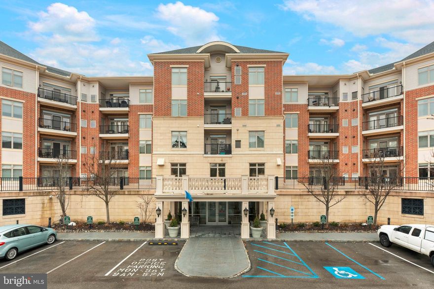 Welcome to easy, elevated living at Huntingdon Place. This sought after penthouse condo offers a rare combination of comfort, convenience, and a thoughtfully designed layout that makes everyday living feel effortless.

Step inside the foyer and you are immediately greeted by beautiful hard flooring that carries throughout the main living space. The open floor plan seamlessly connects the kitchen, dining, and living areas, creating a bright and welcoming atmosphere. The kitchen features tall dark cabinetry, granite countertops, stainless steel appliances, and a well placed breakfast bar, perfect for casual meals or additional seating.

Natural light pours into the living and dining area through large sliding glass doors, which lead out to a private balcony, an ideal spot for morning coffee or unwinding at the end of the day.

This home offers two spacious bedrooms, each with its own full bathroom for added privacy. The primary suite is filled with natural light and includes plush carpeting, a ceiling fan, two walk in closets, and a well appointed en suite bath with a soaking tub, separate stall shower, double vanity, and tile flooring. The second bedroom, currently used as a den and located on the opposite side of the condo, features a full bath with dual access from both the bedroom and hallway, perfect for guests.

A versatile loft overlooking the living room adds extra flexibility, ideal for a home office, guest space, or additional lounge area. Despite the bonus loft, the main level includes everything you need for true one floor living, including the kitchen, living spaces, bedrooms, bathrooms, and laundry.

Residents of Huntingdon Place enjoy a range of amenities including a 24 hour lobby attendant, indoor pool, fitness center, community room, and covered parking garage. This unit includes two parking spaces, and the association fee covers water and gas, making for a truly low maintenance lifestyle.

A bright, open layout, vaulted ceilings, and a prime location come together to create a home that is as practical as it is inviting.