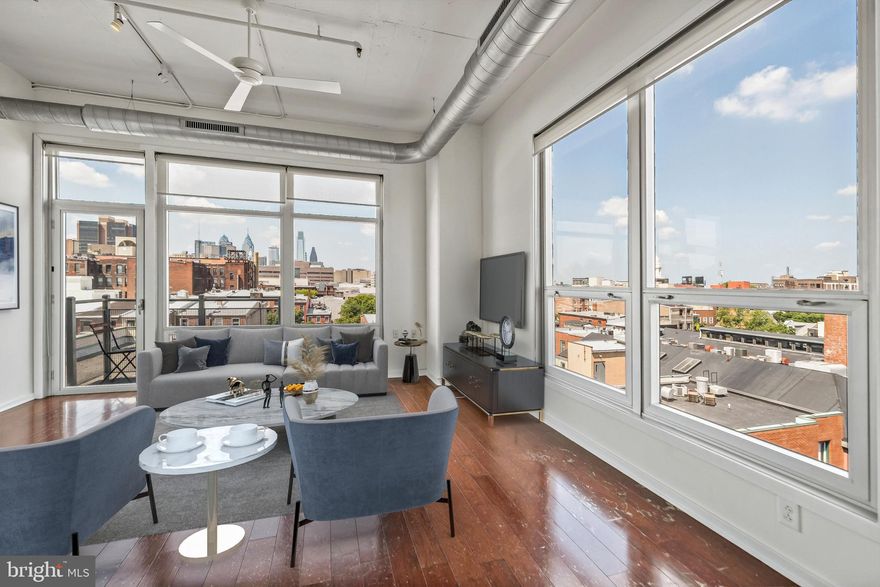 Please note:  This is unit is #6E (6th floor)/

Welcome to 113 North Bread Street, Unit 3E6, Philadelphia, PA – a stunning corner unit that epitomizes modern city living. This sophisticated residence offers 1,106 square feet of meticulously designed space, featuring floor-to-ceiling windows that frame breathtaking city and bridge views.
Step inside this elegant 2-bedroom, 2-bathroom home and be greeted by a contemporary open-concept layout. The modern kitchen is a culinary enthusiast’s dream, adorned with handsome wood cabinetry and sleek finishes that blend style and functionality seamlessly.
Both bedrooms are generously proportioned, providing ample space for relaxation and privacy. The two well-appointed bathrooms feature high-end fixtures and finishes that enhance the overall sense of luxury.
This unit is part of a gated community that boasts beautifully landscaped common areas, offering a serene retreat from the hustle and bustle of city life. Residents enjoy a range of premium amenities, including air conditioning, assigned parking, a bike room, and a health club. The convenience of an elevator and the security of a gated entrance further elevate the living experience.
Parking is a breeze with one car space in the underground garage, ensuring your vehicle is both secure and easily accessible.
Located in the vibrant Old City neighborhood, this home places you at the heart of Philadelphia’s rich tapestry of restaurants, cafes, and cultural institutions. Embrace the urban lifestyle while enjoying the comfort and luxury of this exceptional residence.
Don’t miss the opportunity to make Unit 3E6 at 113 North Bread Street your new home. Schedule a viewing today and experience the epitome of city living.