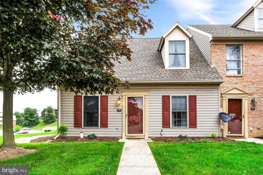 End unit with great views - Laminate flooring in FR and DR - kitchen open to FR - lst floor laundry area and full bath. 2 BR's on 2nd level (one with walk-in closet) and full bath. Nice patio and outside large storage area.  All outside work taken care of by the condo association.