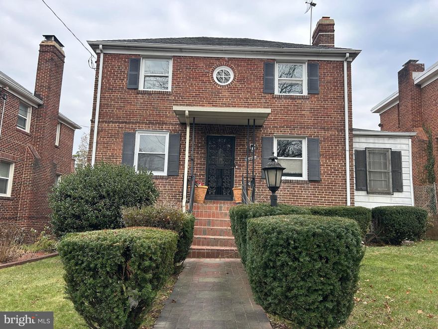 HUGE PRICE IMPROVEMENT! BRING ALL OFFERS!!  Purchase is subject to a short sale!!  Stunning and Spacious brick-front single-family Home tucked away in the vibrant and highly sought-after Woodridge neighborhood, this home offers much more than meets the eye. With over 3,000 sq. ft. of beautifully updated living space, this expansive brick-front single-family home is truly a must-see. The fully finished walkout basement features two bedrooms, a newly remodeled full bathroom, a generous family room, and a convenient laundry area. The upper level boasts five spacious bedrooms, including a master suite, and three fully remodeled bathrooms. The brand-new kitchen is a chef’s dream, complete with sleek stainless steel appliances, gorgeous granite countertops, custom cabinetry, ceramic flooring, and recessed lighting. It seamlessly flows into the adjacent family room, which is highlighted by a charming wood-burning fireplace. An additional remodeled half bath ensures plenty of space for your family and guests.  The inviting living room also features its own fireplace, making this home perfect for cozy gatherings. Gleaming new hardwood floors run throughout the main level, and a formal separate dining room adds an elegant touch to the space. Enjoy year-round comfort with the enclosed porch addition, equipped with heating and air-conditioning, perfect for relaxing no matter the season. The private fenced backyard provides a tranquil retreat, while the parking pad in the rear adds convenience and ease. Unbeatable Location. Located just one mile from the Rhode Island Ave Metro, this home offers unmatched access to the best of DC living. You’ll be moments away from a wonderful array of restaurants, including Primrose and Brookland's Finest, as well as local favorites like Zeke's Coffee and the Woodridge Library. For outdoor lovers, Langdon Park Rec Center and Pool are nearby, and the Metropolitan Branch bike trail is just around the corner. New developments along Bryant Street bring even more exciting dining and shopping options. With multiple grocery stores such as Giant and MOM’s Organic Market, and a variety of local breweries, everything you need is within reach. This remarkable home offers both luxury and convenience in one of DC's most desirable neighborhoods—welcome home!