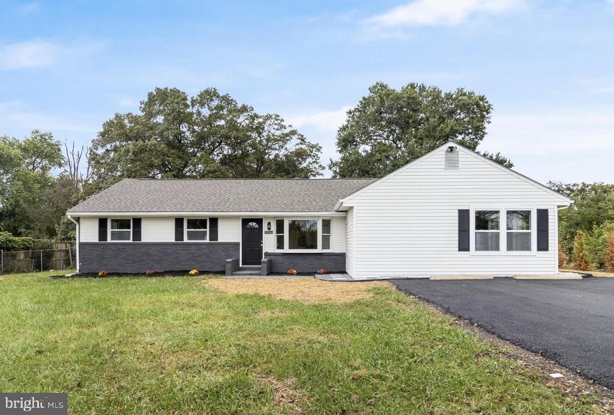 Style, substance, and space—all perfectly packaged in this head-to-toe renovated rambler...From the moment you arrive, the bold black-and-white exterior, manicured landscaping, and welcoming front porch set a confident and modern tone... Inside, the open-concept layout stuns with wide-plank luxury vinyl floors, crisp neutral paint, recessed lighting, and a seamless blend of form and function....The heart of the home is the designer kitchen—showcasing gleaming white cabinetry, quartz countertops with a dramatic waterfall edge, a large center island with bar seating, and a full suite of stainless steel appliances...Gold hardware and custom lighting add just the right amount of glam... The spacious living and dining areas flow effortlessly, framed by large windows and natural light... the private owner’s suite offers a serene retreat with generous closet space and a spa-like ensuite bath, featuring a custom walk-in shower with stone inlay and designer tile.... Three additional bedrooms share a beautifully updated second full bathroom with coordinating finishes... Outside, enjoy a large, level backyard perfect for entertaining, relaxing, or creating your dream outdoor space... Detached garage offers ample room for parking, storage, a workshop—or even a future studio... Everything in this home has been upgraded for modern living: new HVAC, new roof, updated plumbing and electrical, and premium finishes throughout... Located just minutes from shopping, restaurants, schools, and major commuter routes—this turn-key gem combines thoughtful design with everyday convenience...Don't miss out on your chance to own this stunner...Scheduled your showing today.