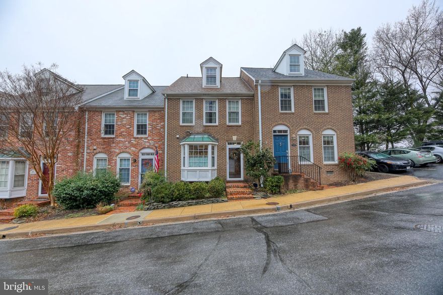 GREAT LOCATION! 3BR / 2.5BA Sun-filled brick Townhome quietly nestled behind the Masonic Temple in a sought-after neighborhood rarely on the market! Features: 3rd Level Loft, Hardwood Floors, Sep Dining Rm, Fireplace in Living Rm, French doors from Living Rm to Custom Deck. Easy walk to King St. Metro & charming Old Town. A commuter's dream!