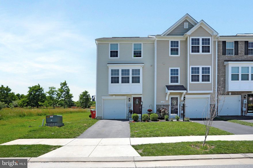 END UNIT Townhome in sought after Fairfax Crossing Community! This 3 level home features 1900+ Sq. Ft of living space and includes 3 Bedrooms, 2.5 Baths, and the 3 level Morning Room bump out option on the rear! Main level open layout with Living Room, Kitchen, Dining Area, and Morning Room. Upper level has the Primary Owner Suite with attached full bath with soaking tub, separate shower, and double sinks. The two Junior Bedrooms share a full bath. Lower level has a Rec Room area which can also act as a 4th Bedroom or office space!