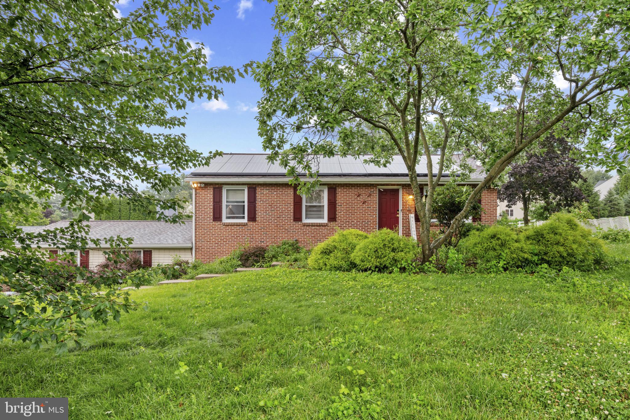 This sweet ranch at 3973 Locust Grove Road is ready to welcome you home! Sitting on nearly half an acre in a quiet Columbia neighborhood, this 4-bedroom, 2-bathroom home gives you comfort, space, and room to grow. Step inside to a sunny living room with hardwood floors and big windows that fill the space with light. The kitchen is bright and easy to cook in, with a range, microwave, and dishwasher all included. There’s a cozy dining area where you can enjoy pancakes in the morning or dinner with loved ones. Three bedrooms and a full bathroom are just down the hall. Downstairs, a fully finished basement gives you a big open area, plus a fourth bedroom and a second full bathroom—perfect for guests, an office, or extra play space. The house stays cool in the summer with central air and warm in winter with a steady, easy-to-manage heating system. A leased solar panel system adds a smart way to help keep monthly bills lower. Outside, enjoy a big backyard with lots of room for games, gardens, or relaxing on summer evenings. The car garage has a side entry and space for tools and storage, and the driveway fits several cars. You’ll love the peaceful feel here, just minutes from Route 30, parks, and shopping. This home is part of the Hempfield School District and comes with all major appliances. With so much space inside and out—and features that make life easy—this move-in-ready 4-bedroom home is full of charm and waiting for someone new to love it.