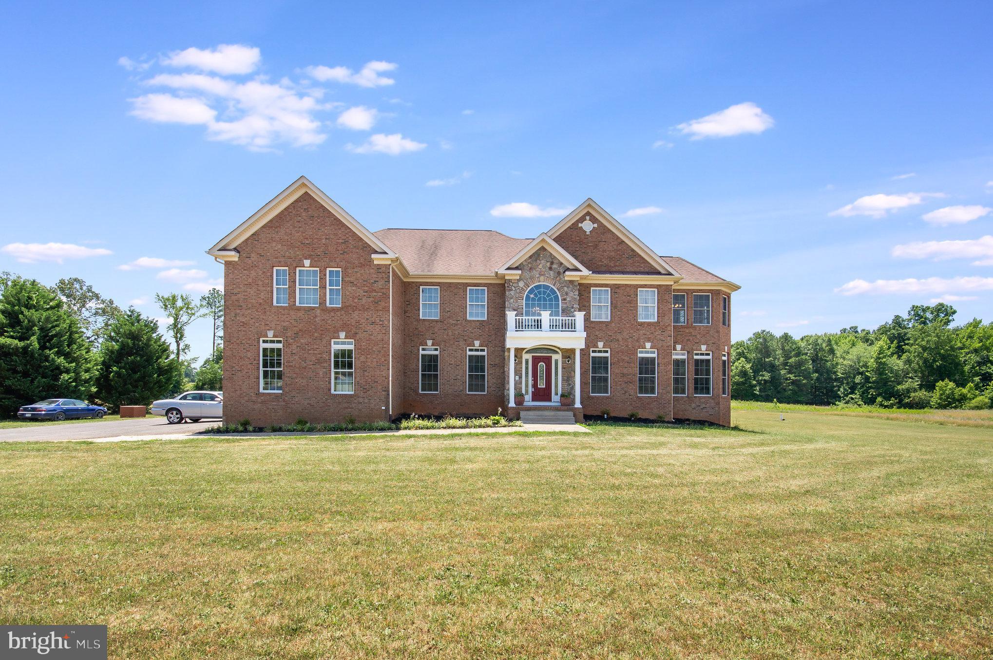 MOTIVATED SELLER! This expansive 4-bedroom estate with 6,025 sq ft. has 4.5 bathrooms, with each bedroom having direct access to a bathroom. It sits on 6.5 acres and offers unparalleled space and flexibility for modern living. The home boasts 2 kitchens, a large kitchen island with storage and a wine fridge, a formal dining room, formal living room, a sunroom and a 3 seasons room. Unwind in the inviting 2 story family room with a 2 story stone fireplace. This space opens to the large family room.
The top level contains 4 bedrooms, 3 full bathrooms and the laundry room. The luxurious master suite features a walk in closet with built in storage system, spa-like bathroom with a jacuzzi tub and a dual head shower, plus a cozy sitting room.
The partially finished basement has a kitchen, media room and another full bathroom. There is space for another living area, a possible 5th bedroom (NTC) and more storage space.
Additional Highlights Include:
Home office for ultimate work-from-home convenience, Spacious 2 story foyer entry, Mudroom for organization that is out of sight and convenient to the garage, Walkout basement that expands your living space, Walk-in pantry for ample storage, Newly painted and refinished hardwood floors on the main level, Spacious laundry room on the top floor with built in storage, Dual staircases for easy access to the top level, Trex deck for outdoor entertaining, Dual zone heating and air conditioning for year-round comfort., A whole house intercom with radio and CD. Don't miss this opportunity to own a piece of paradise!
AC- 2004 Dual Heat Zone System- 2020 Propane Tank- 1,000 gallons, owned, buried
Roof- 2004 (It is a 40 year shingle) Trex Deck- 2020
Water Heater- 2022 Well Pump- 2022 Microwave- 2024
Sump Pump & backup battery - 2024
Seller has a service contract on the HVAC/Furnace systems through United Air Temp.
Seller is offering a 1 year Home Warranty valued up to $800.